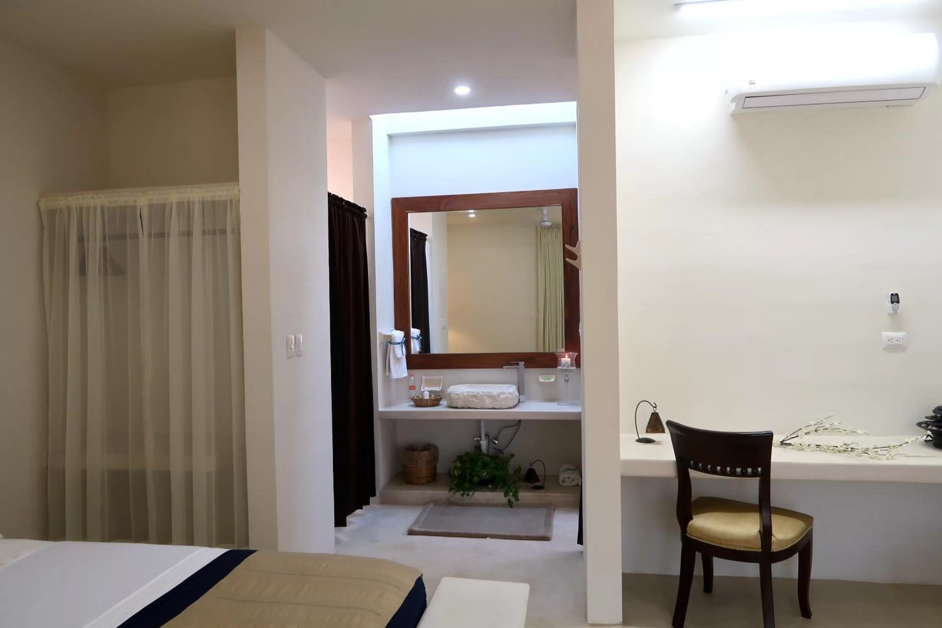 Living room, TV/Entertainment Center in Hotel Casa de Campo Conkal Merida