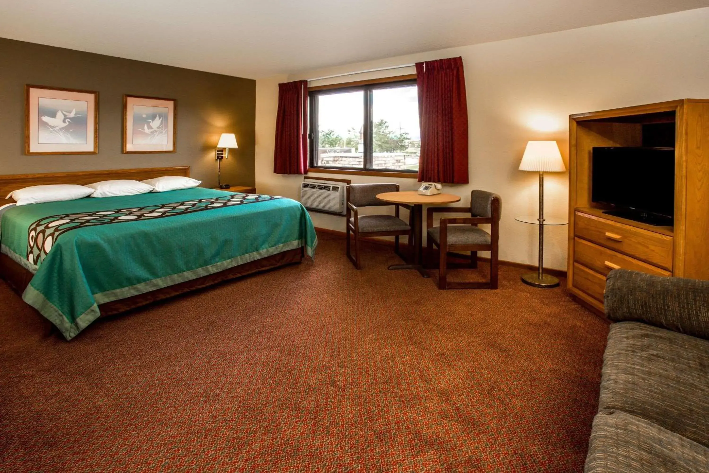 Photo of the whole room in Super 8 by Wyndham Hartford WI