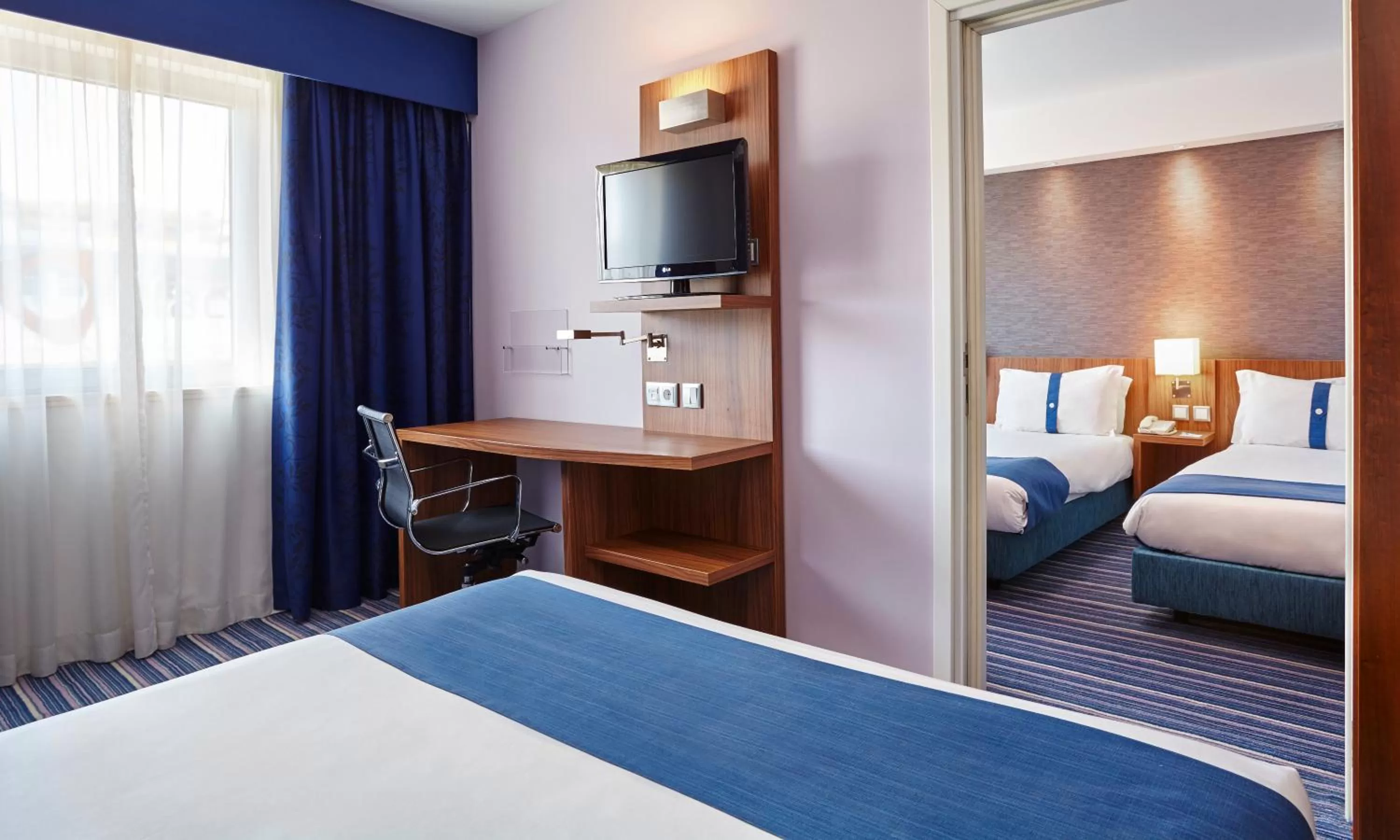 Photo of the whole room, Bed in Holiday Inn Express Lisbon Alfragide by IHG