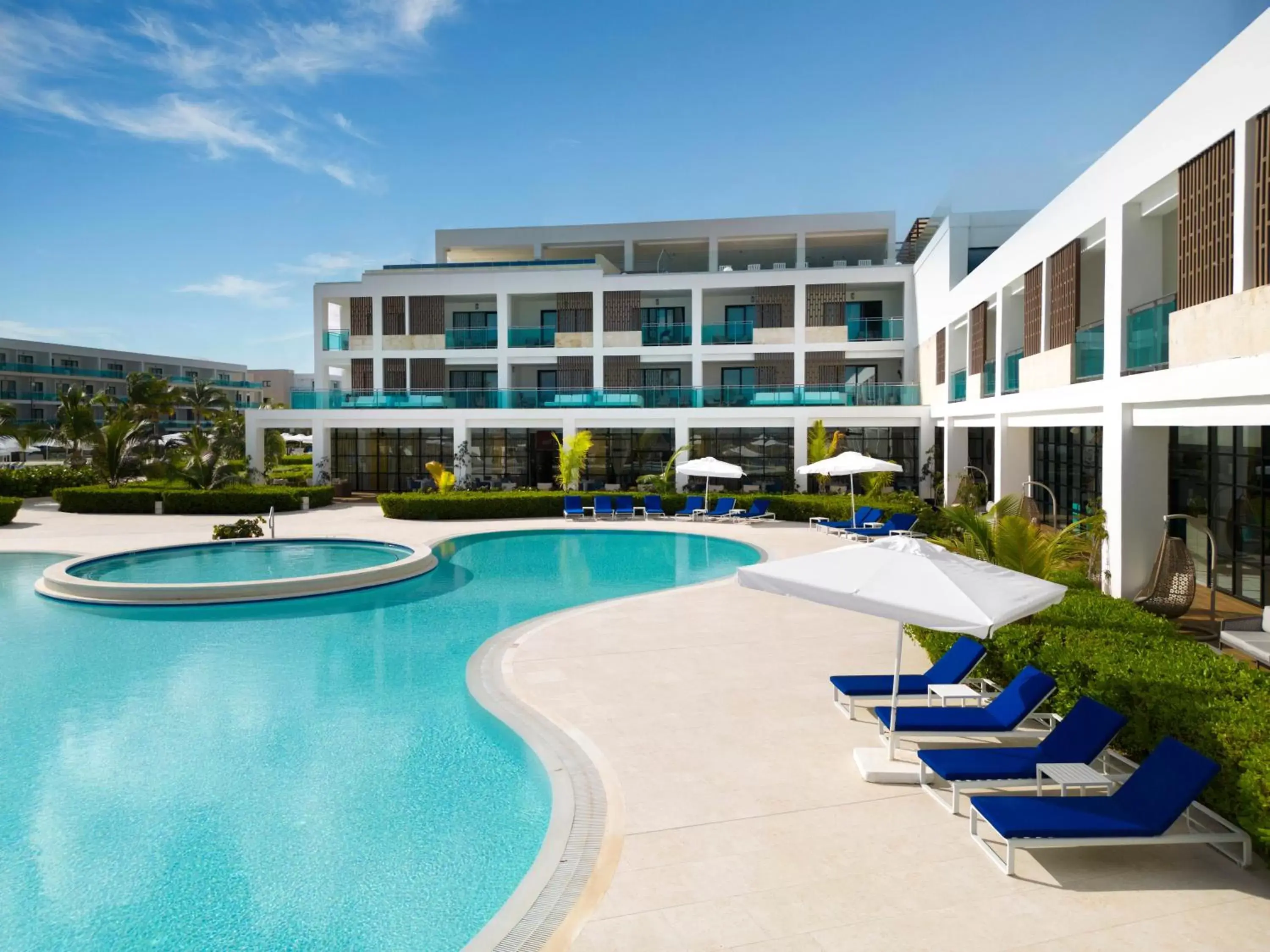 Swimming pool, Property Building in Serenade Punta Cana Beach & Spa Resort