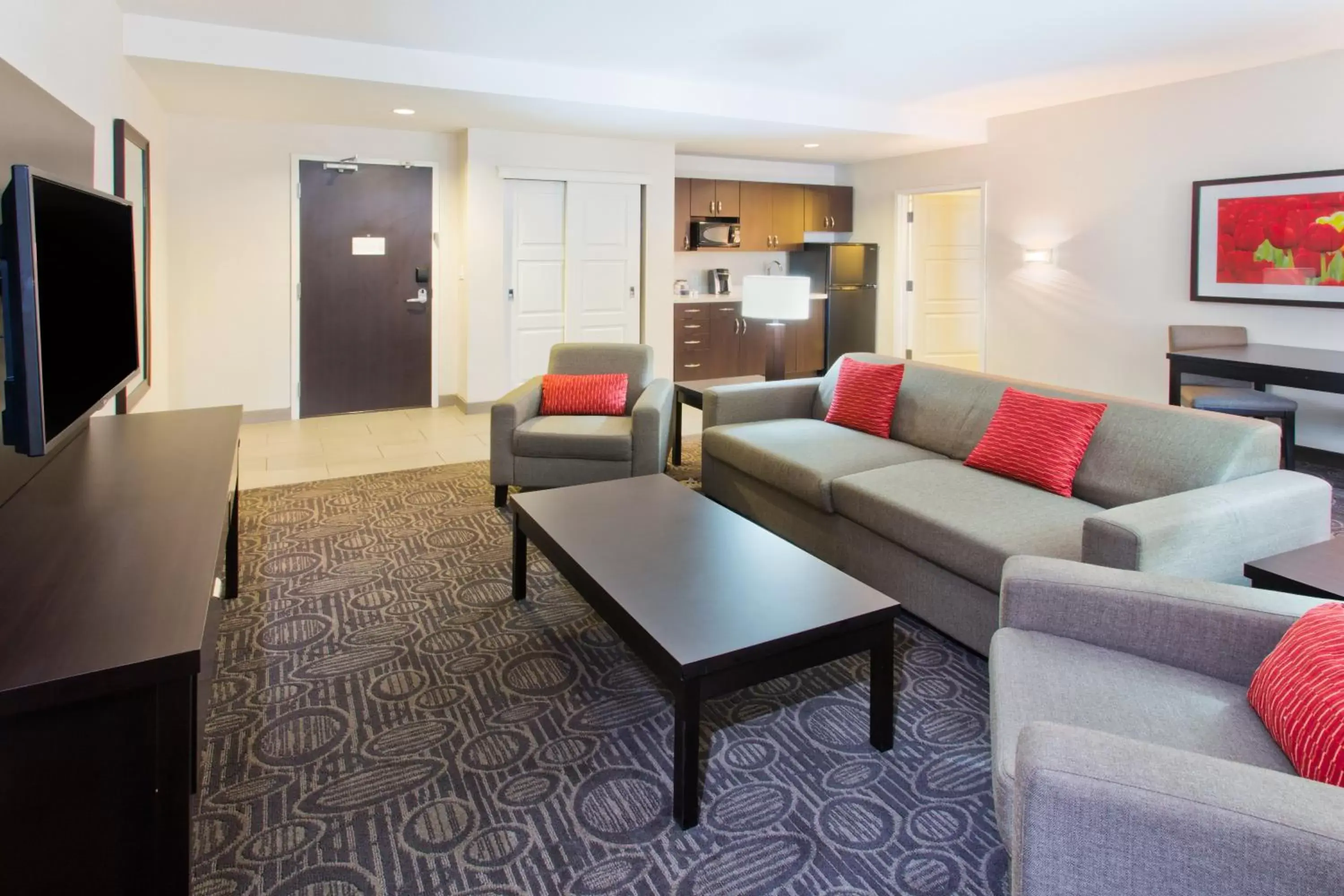 Photo of the whole room, Seating Area in Holiday Inn Hotel & Suites Red Deer, an IHG Hotel