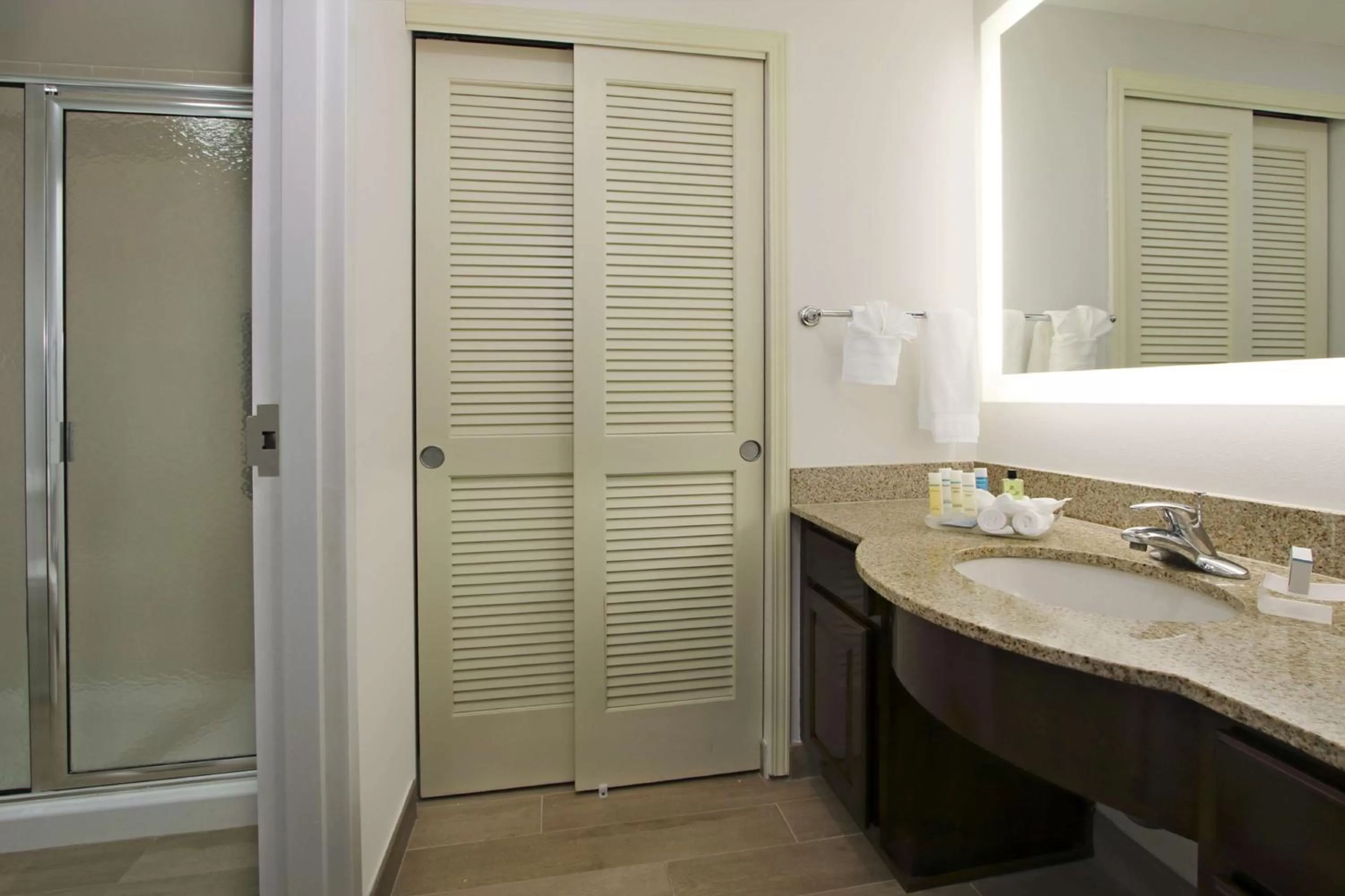 Bathroom in Homewood Suites by Hilton Miami - Airport West