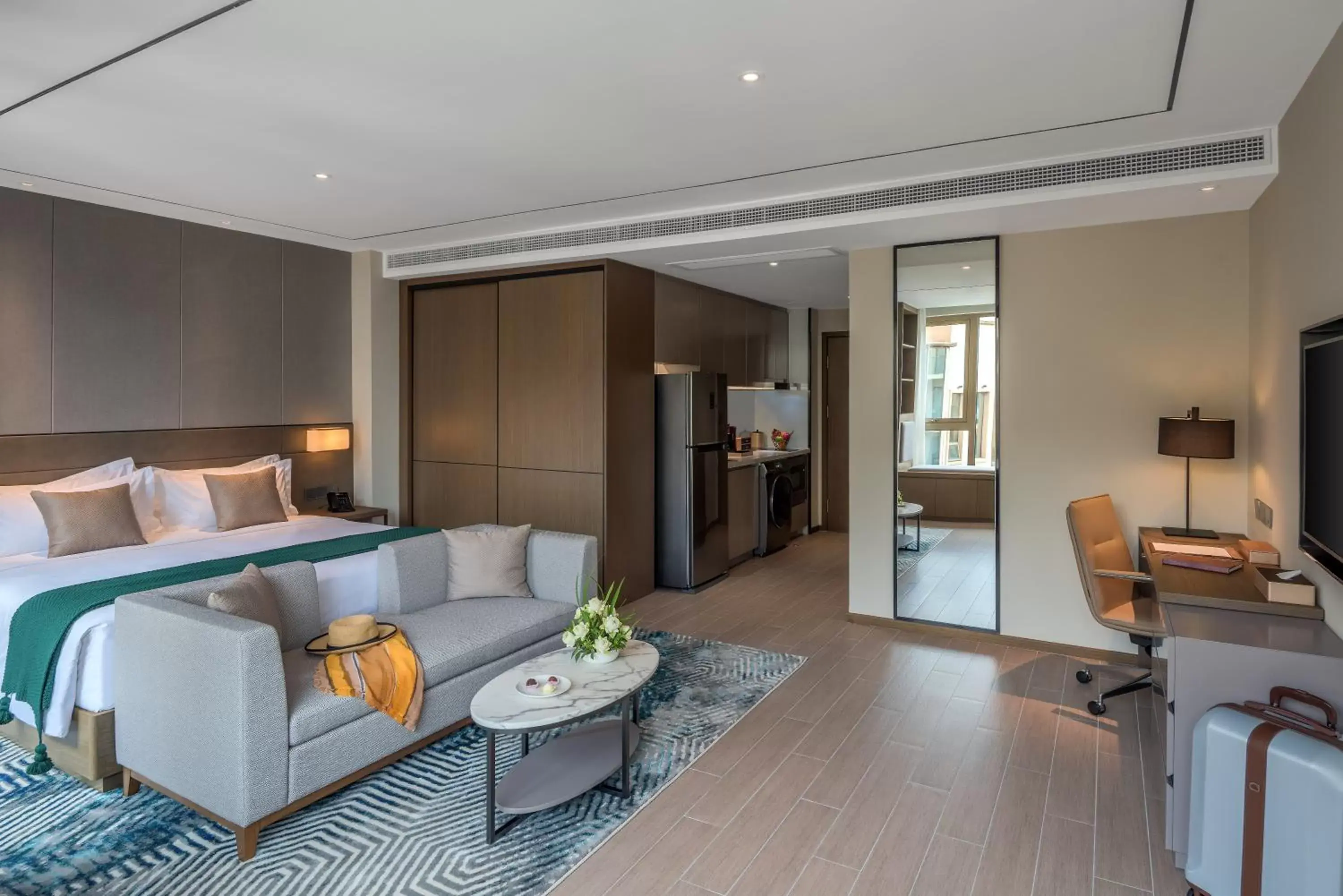 Communal lounge/ TV room, Bed in Oakwood Premier Phnom Penh Communal lounge/ TV room, Bed in Oakwood Premier Phnom Penh