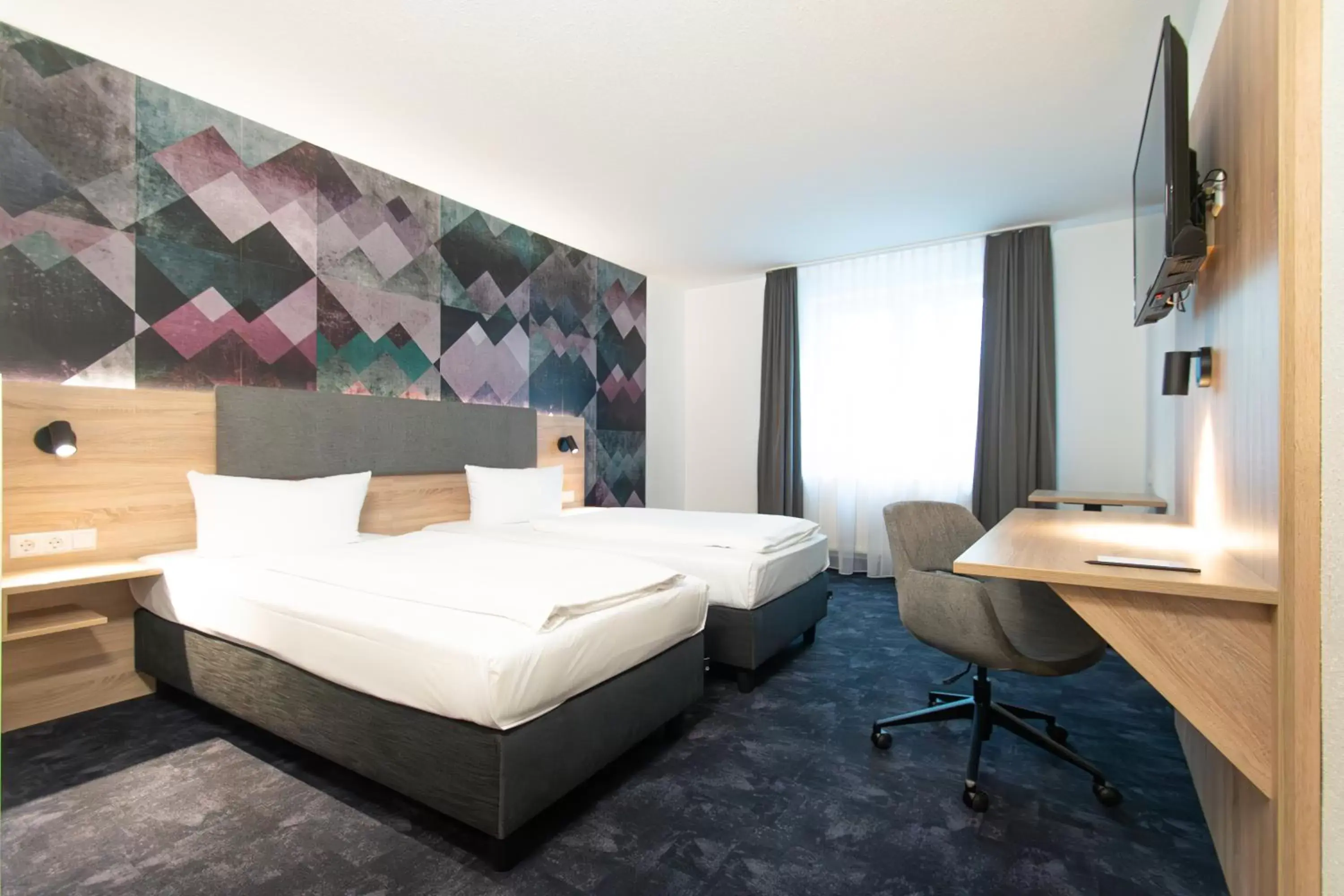 Photo of the whole room, Bed in Taste Hotel Jettingen