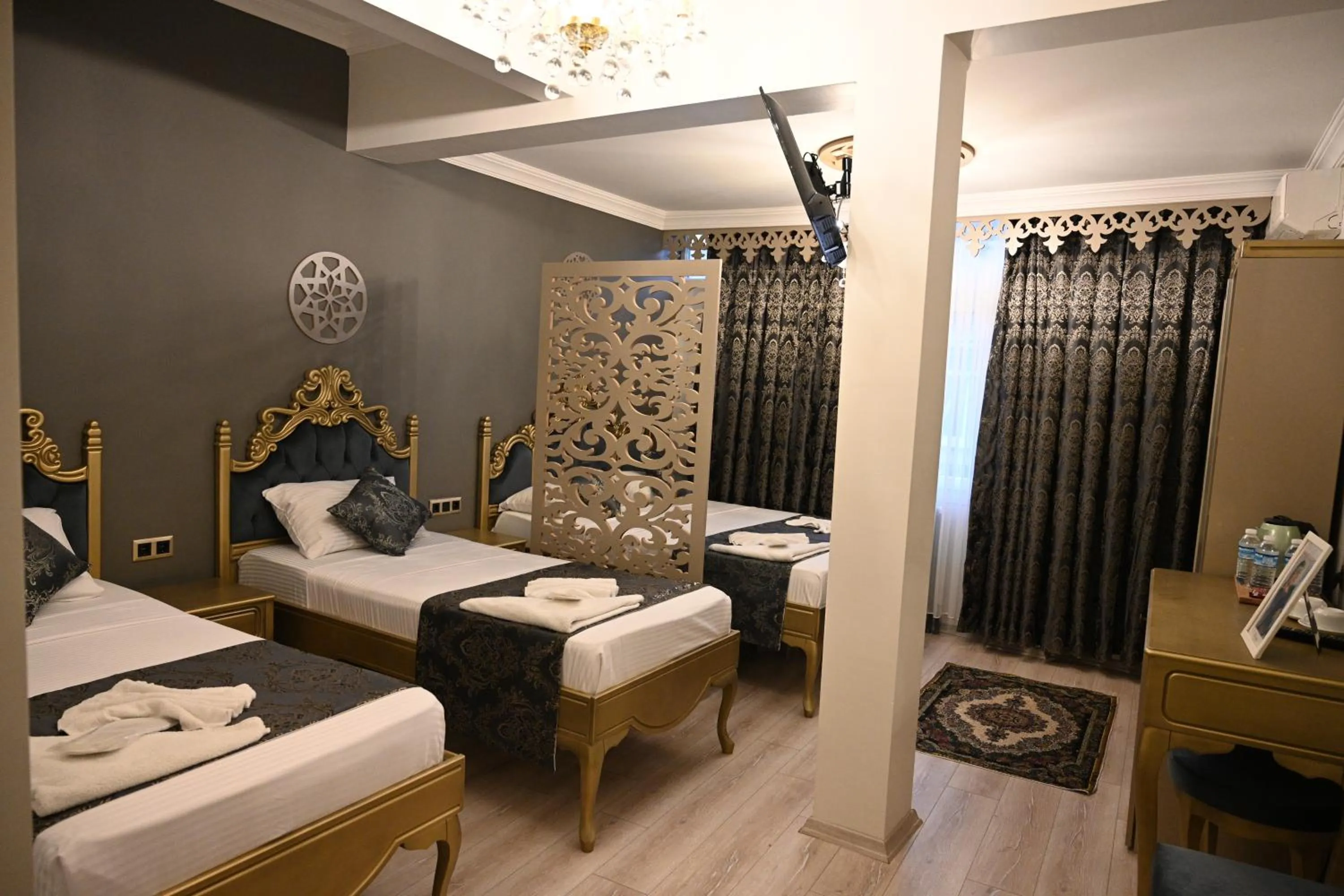 Bed in Ethnica Suites