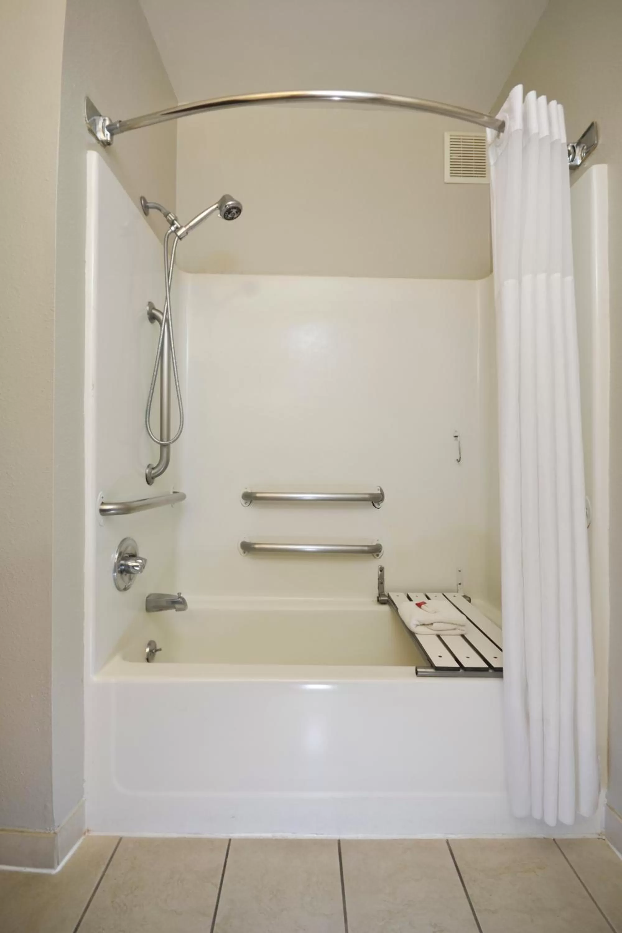 Bathroom in Days Inn & Suites by Wyndham Airport Albuquerque