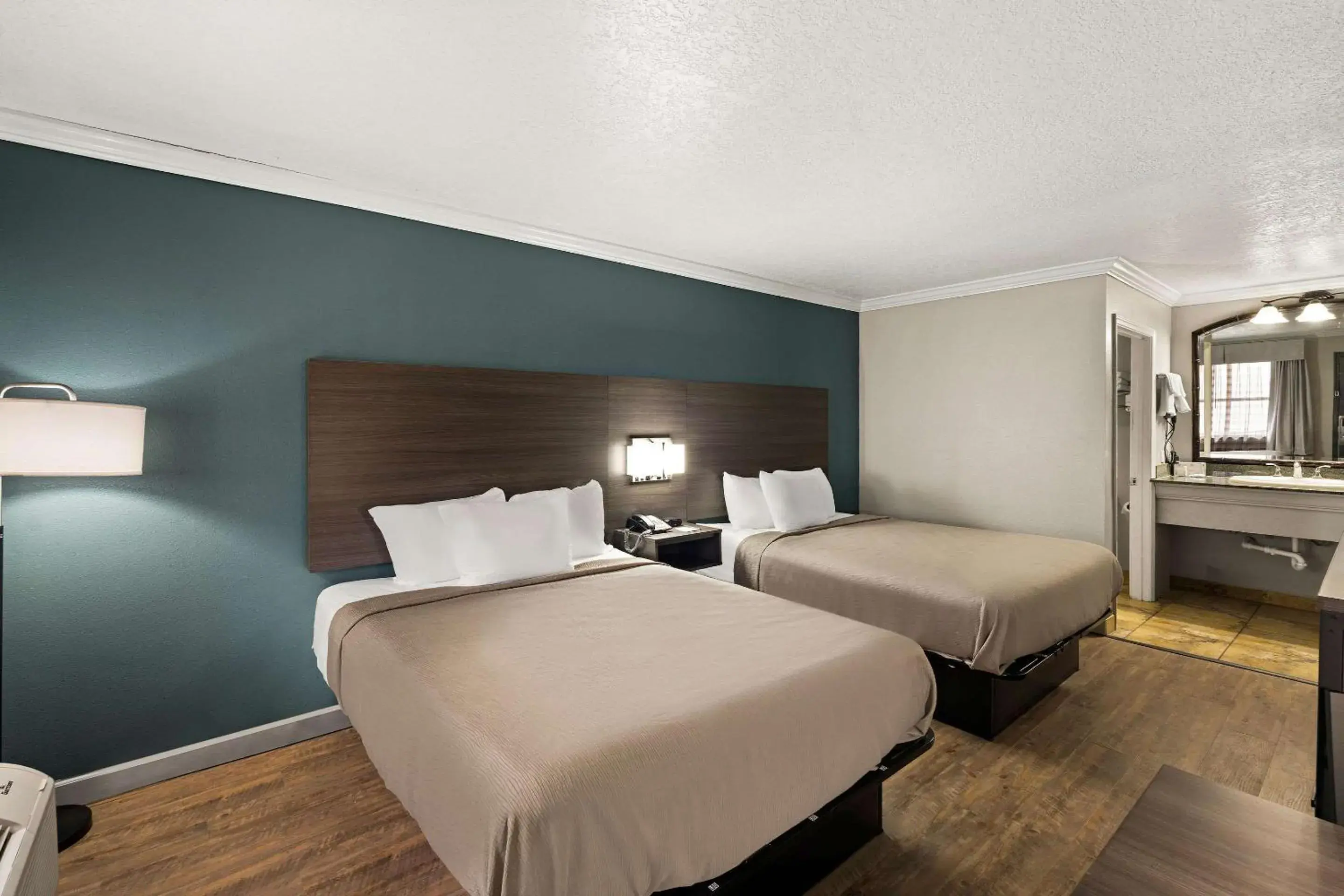 Bedroom, Bed in Travelodge by Wyndham Ocean Springs