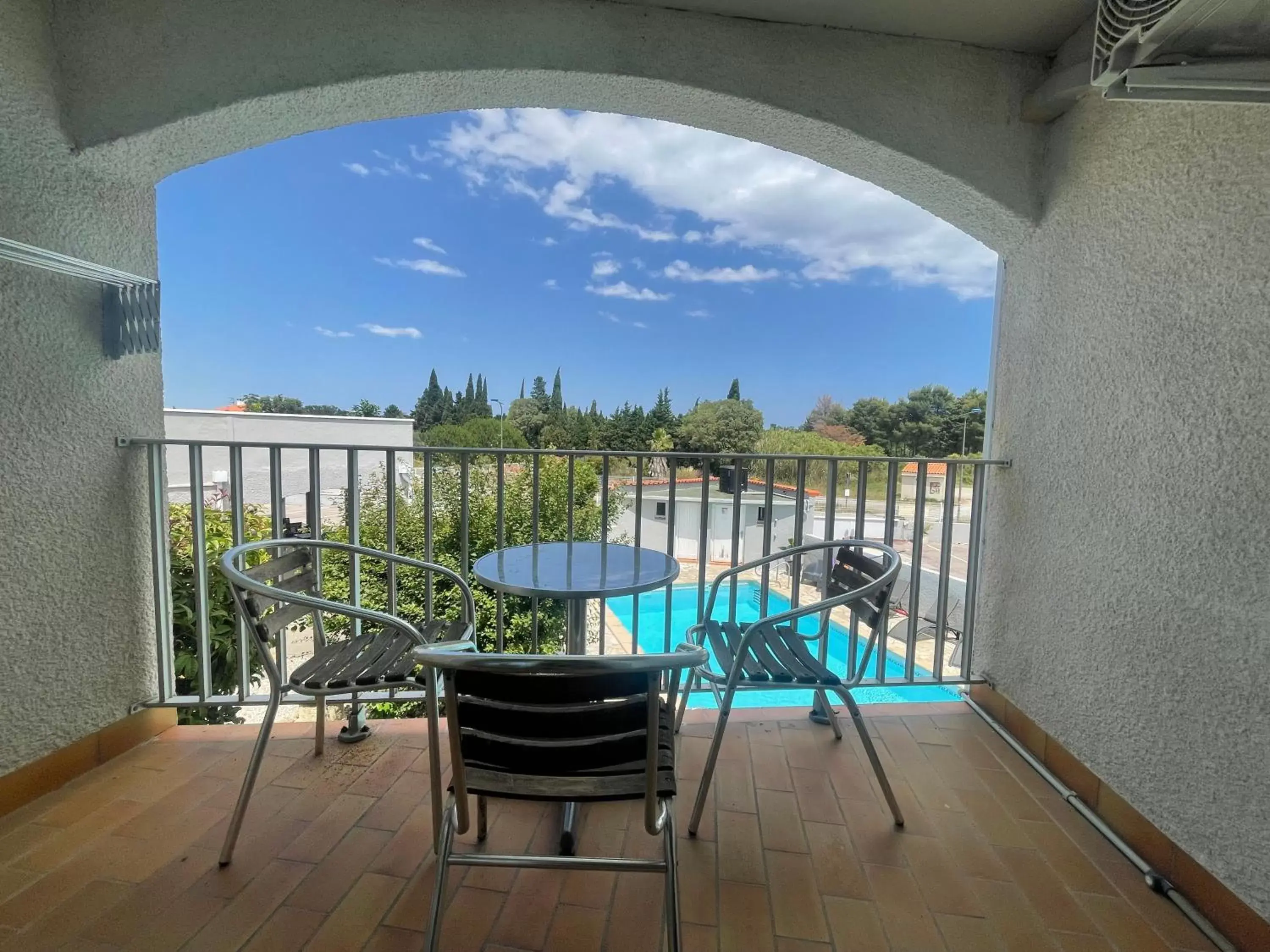 Balcony/Terrace, Pool View in Acapella Hotel, Appartements