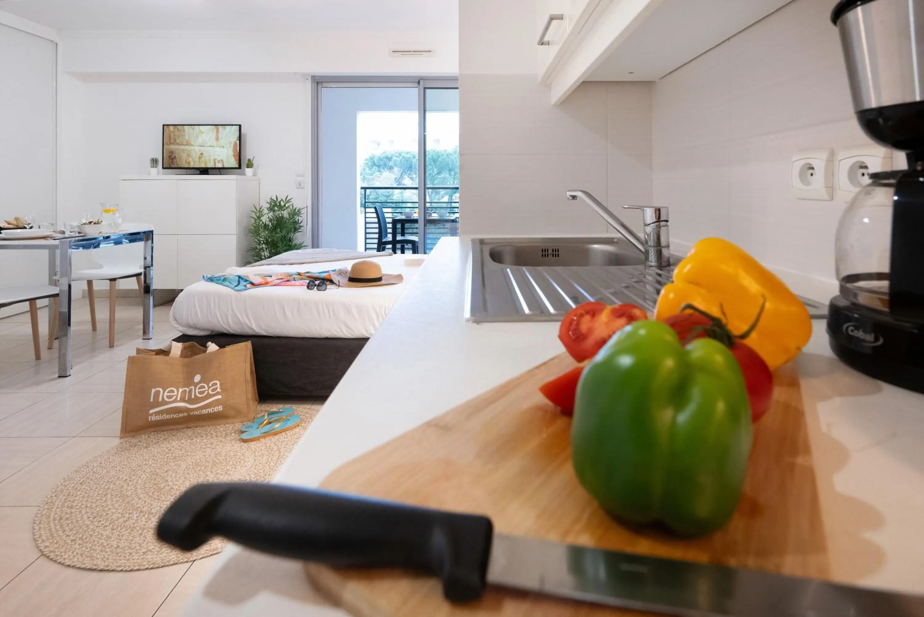 Kitchen or kitchenette in Nemea Appart Hotel Le Lido Cagnes sur Mer