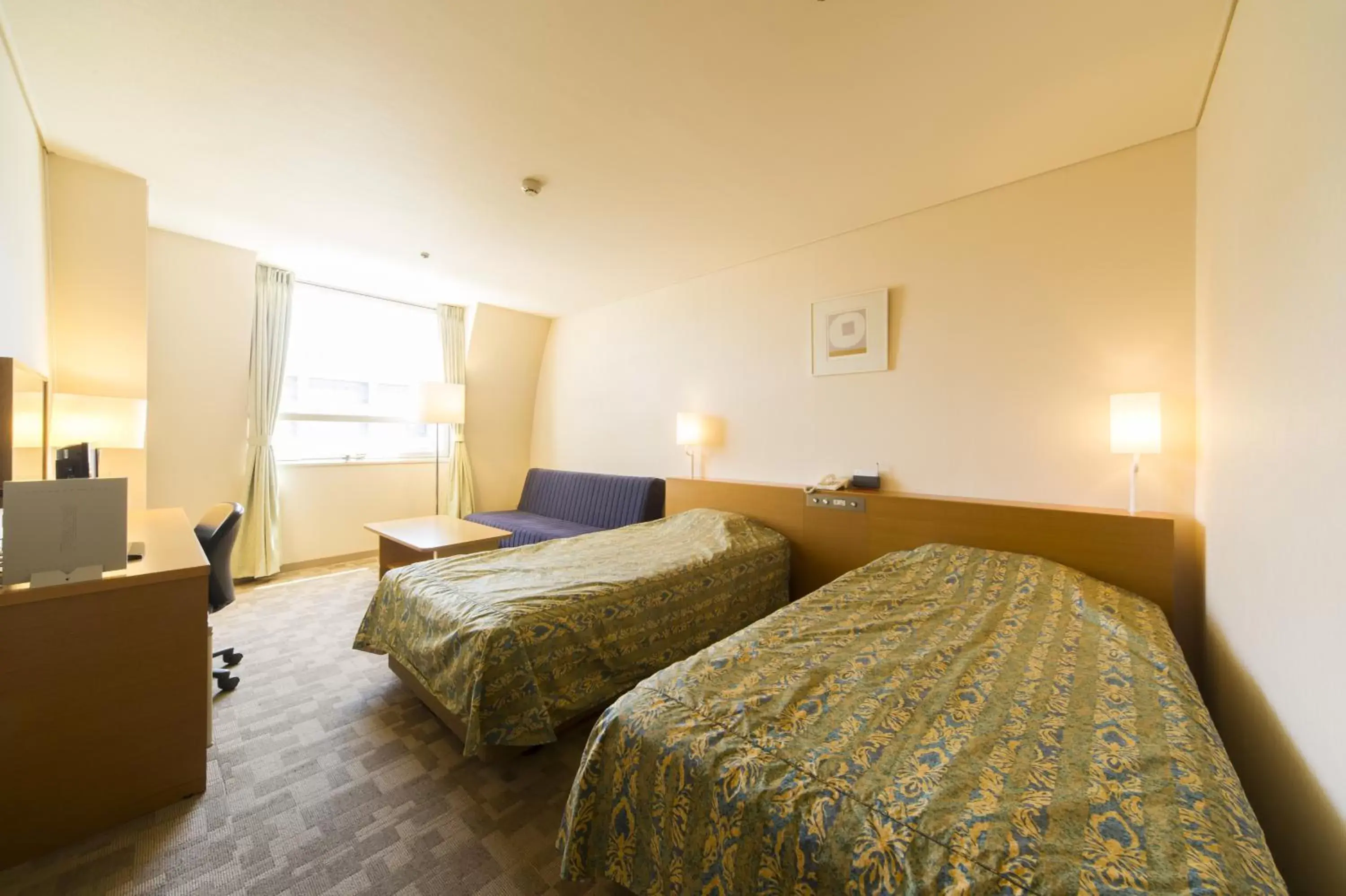 Photo of the whole room, Bed in Hotel Hiroshima Sunplaza