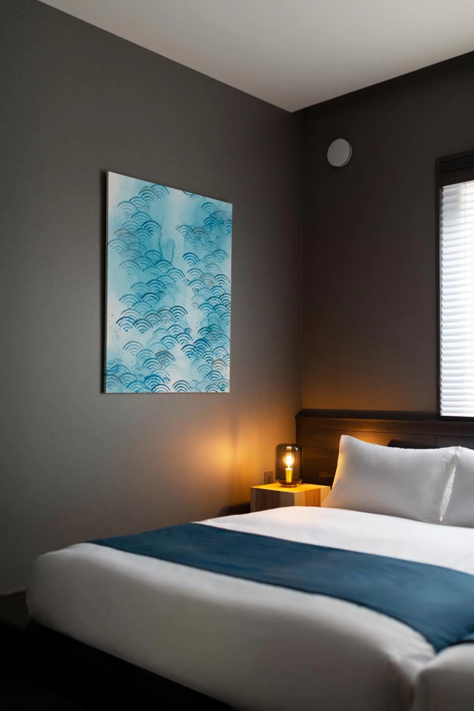 Bed in THE MACHIYA HOTEL TAKAYAMA