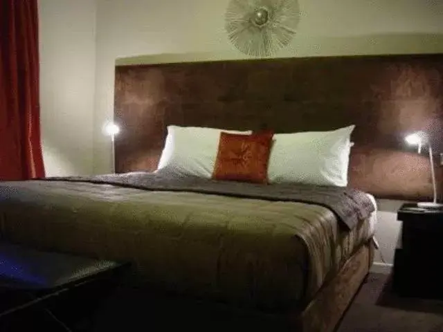 Bed in Terra Vive Suites & Apartments