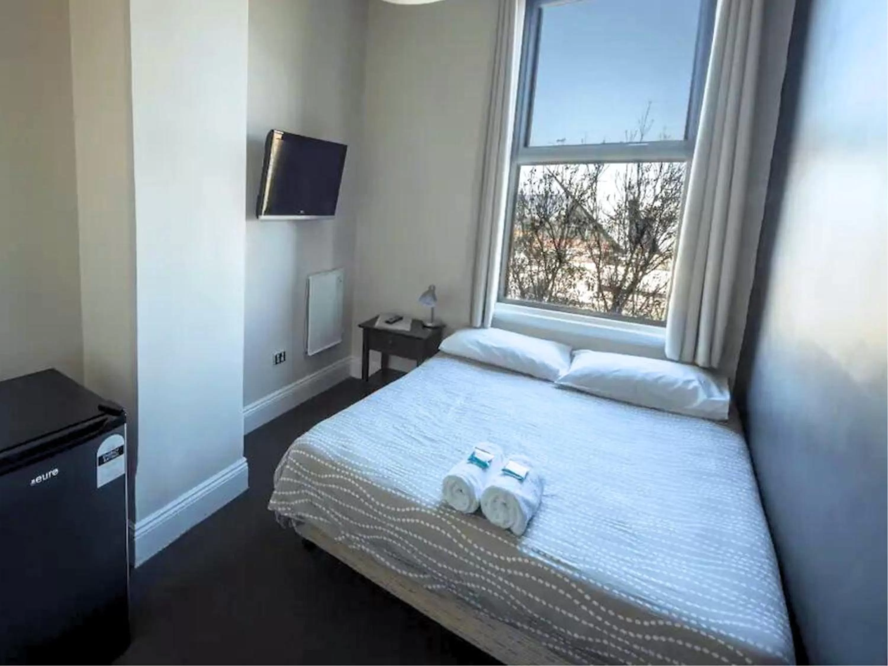 Bed in Six Degrees Boutique Hotel