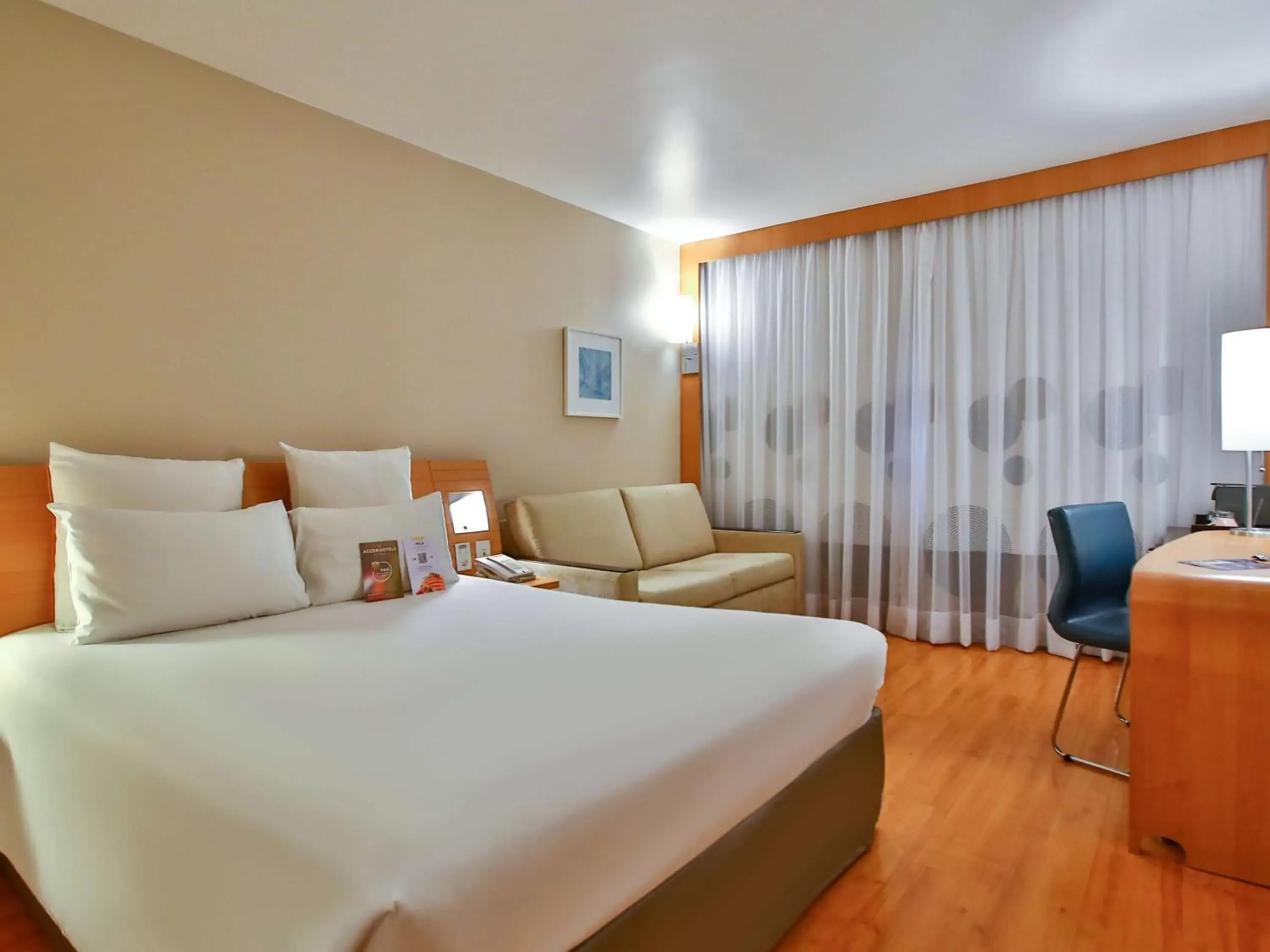 Photo of the whole room, Bed in Novotel RJ Santos Dumont