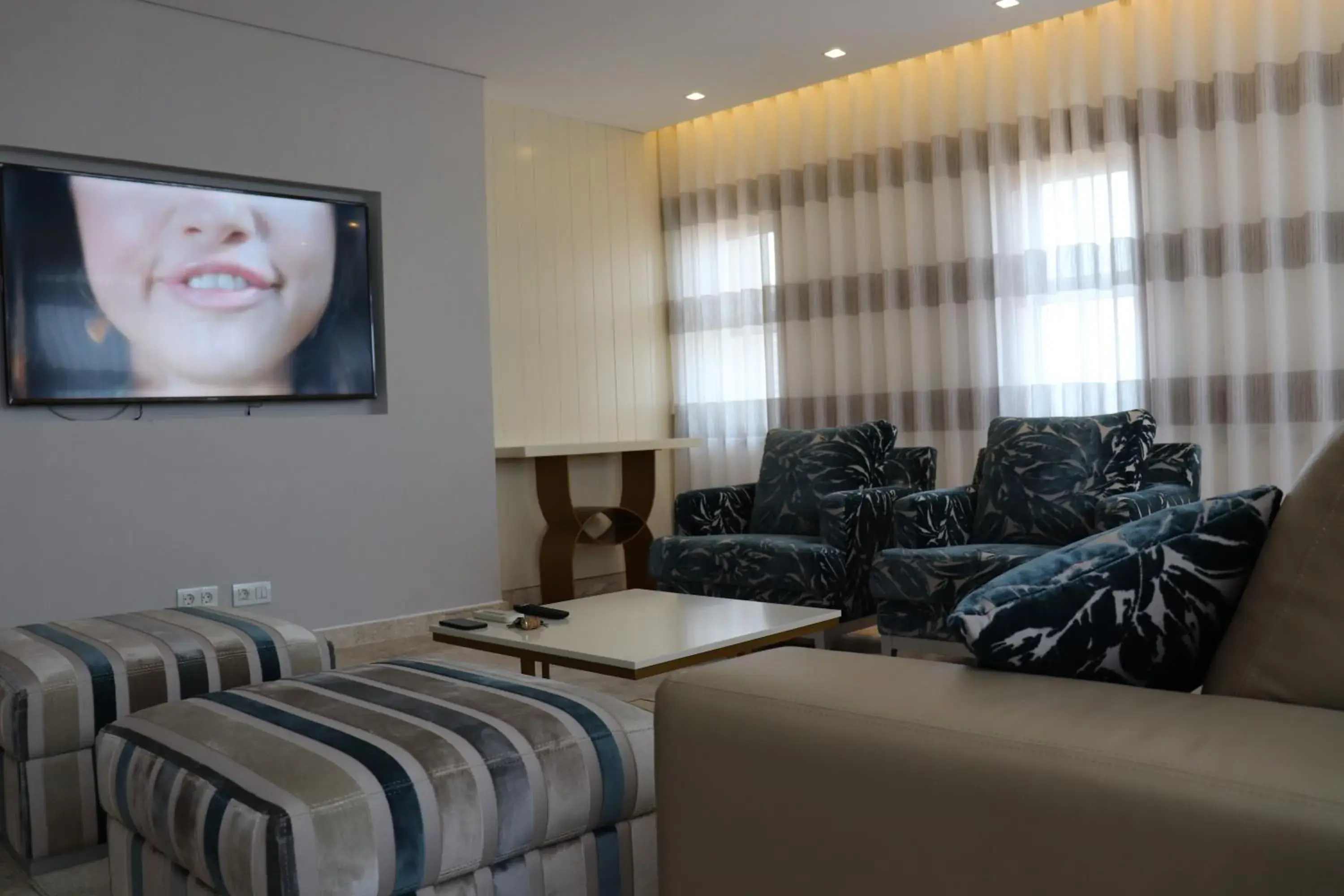 TV and multimedia, TV/Entertainment Center in Afrin Prestige Hotel
