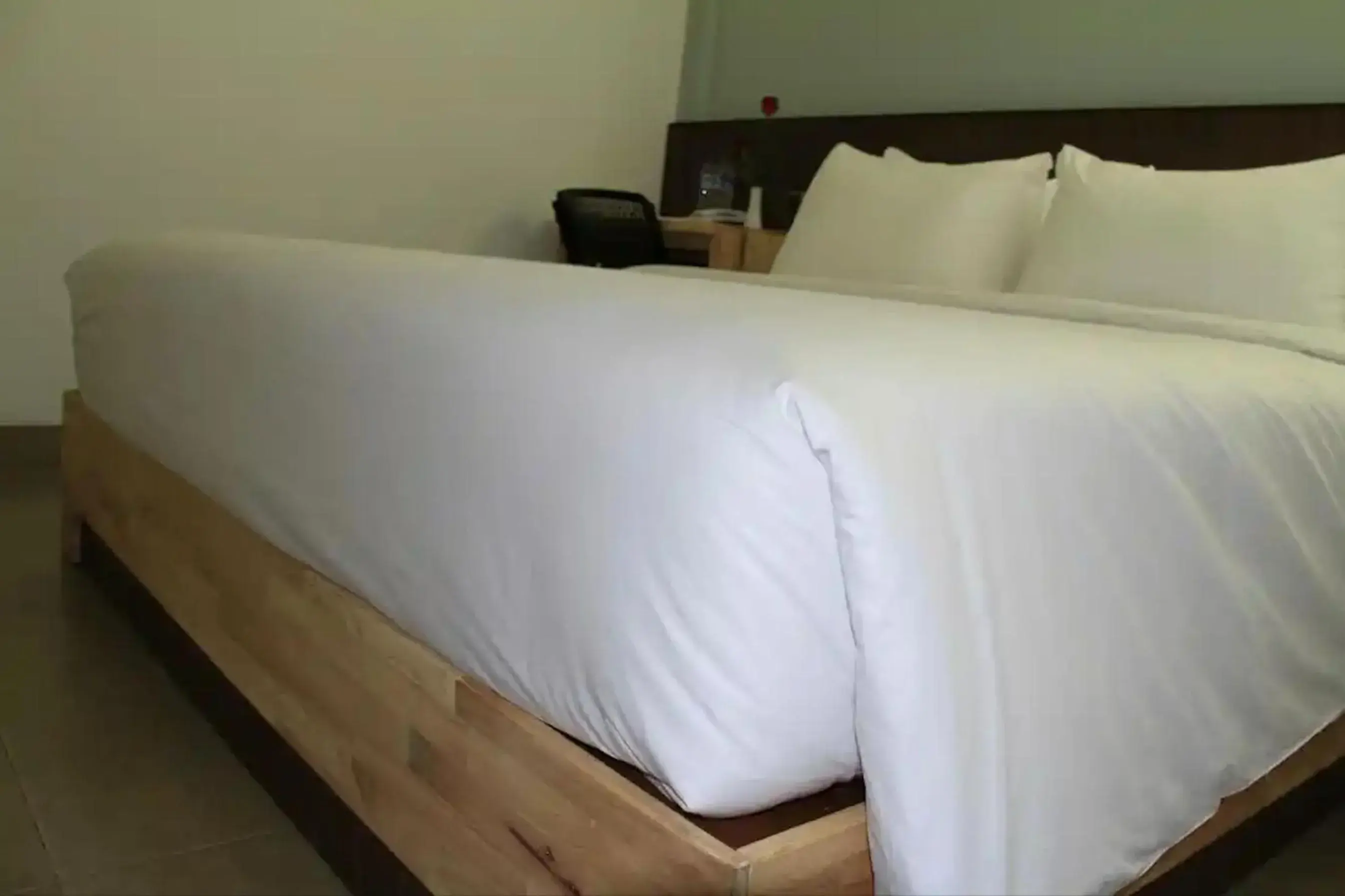 Bed in Duo Legian Hotel