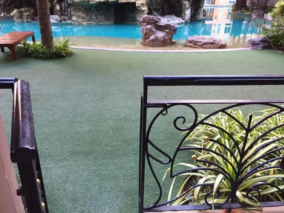 Patio, Pool View in Atlantic Condo Resort Pattaya by Panisara