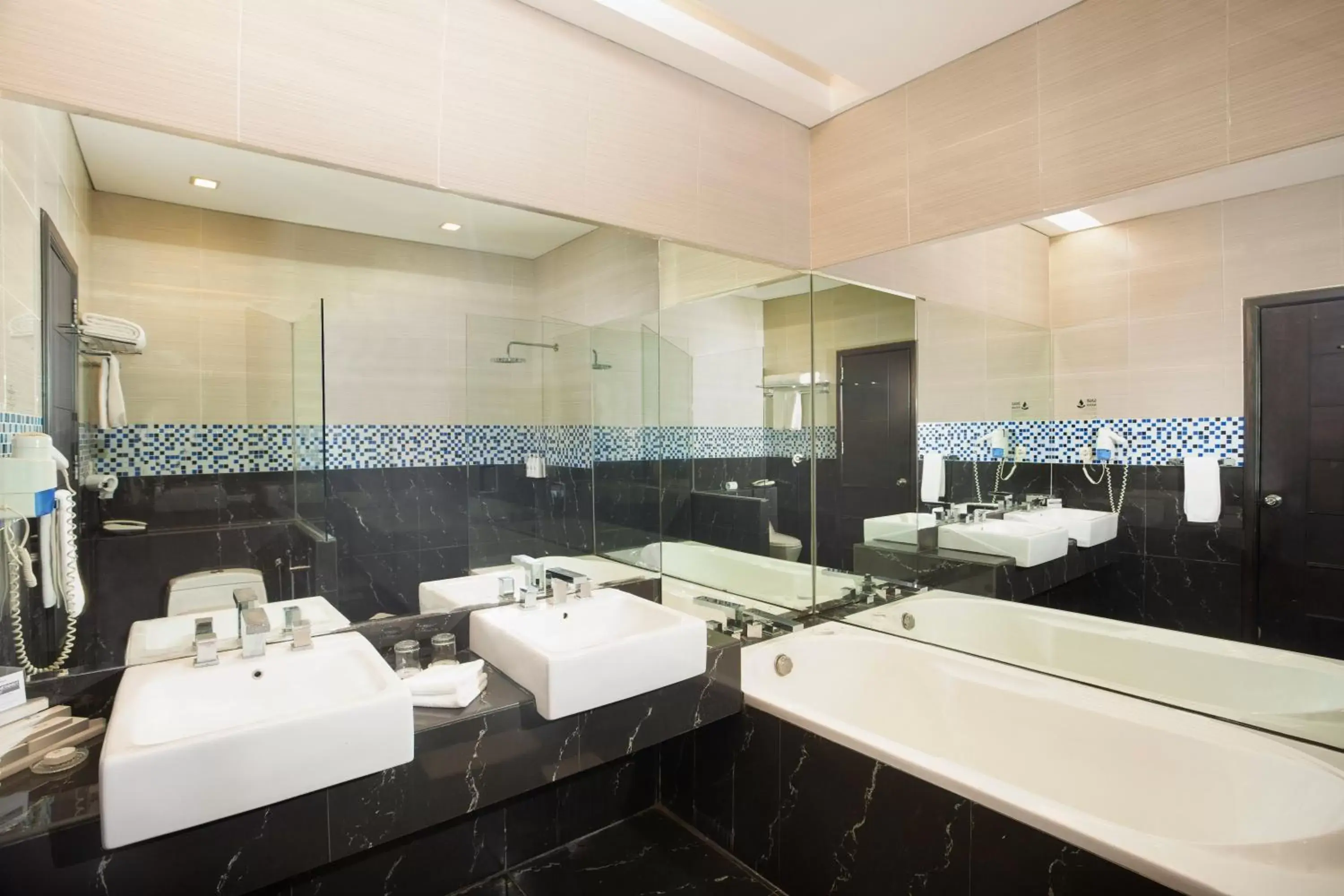 Bathroom in Swiss-Belhotel Kendari