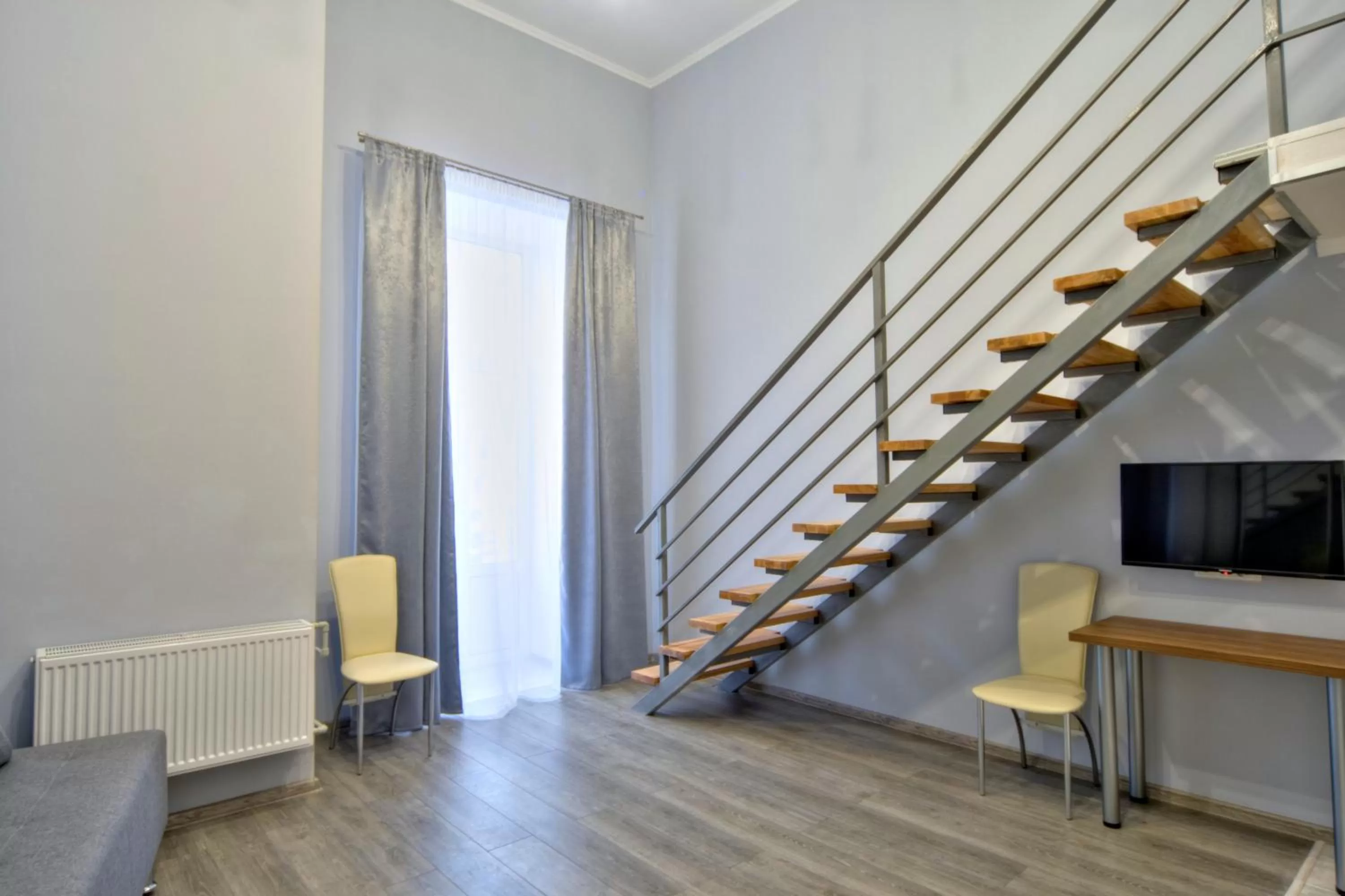 Living room in Grand Apartments