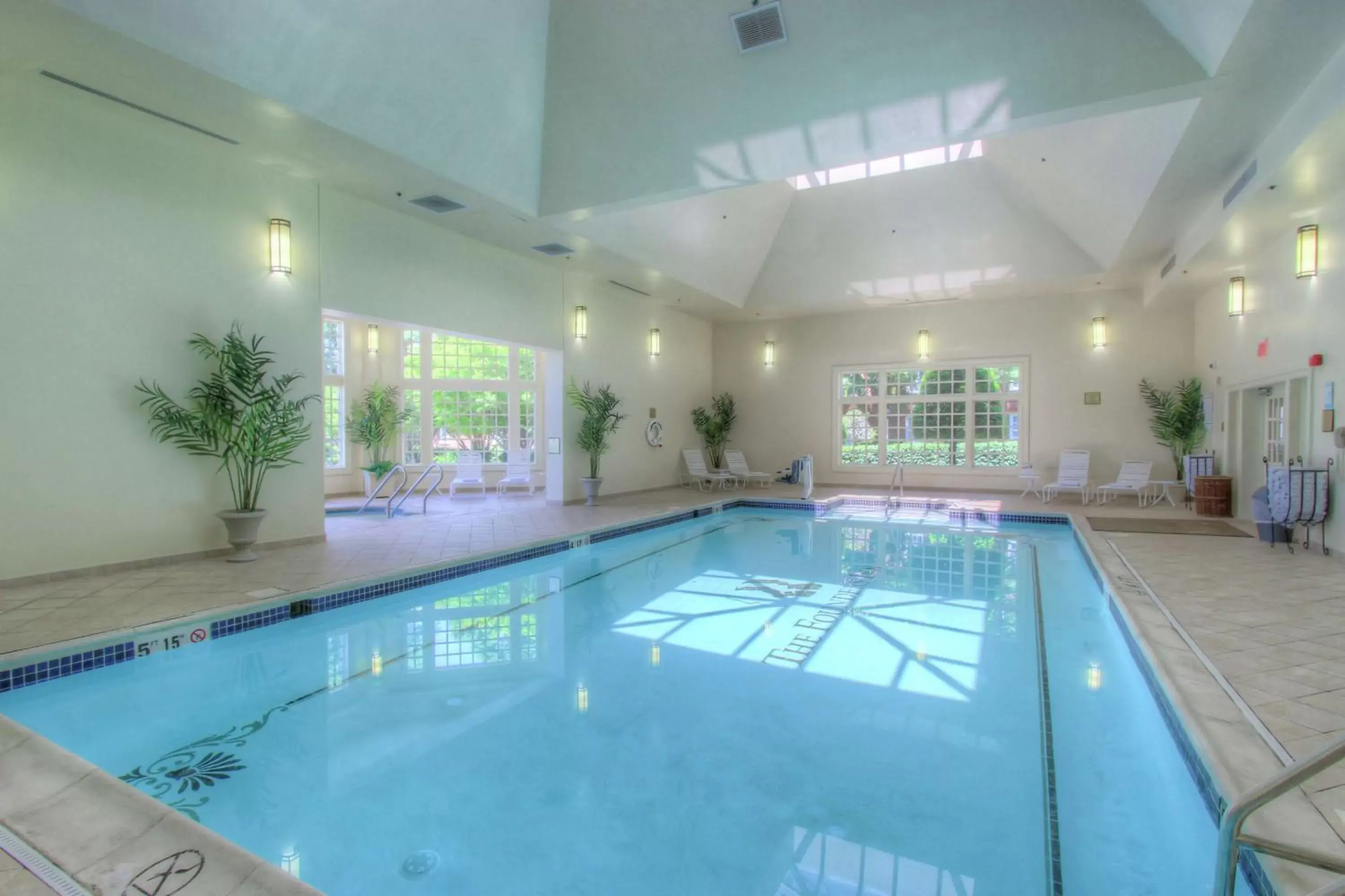 Swimming Pool in The Founders Inn & Spa Tapestry Collection By Hilton