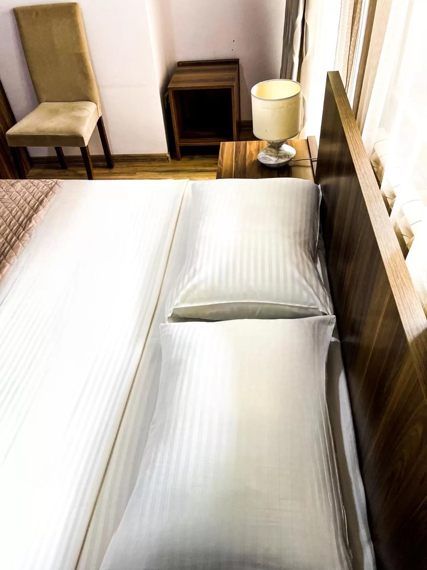 Bed in Hotel Dcorner