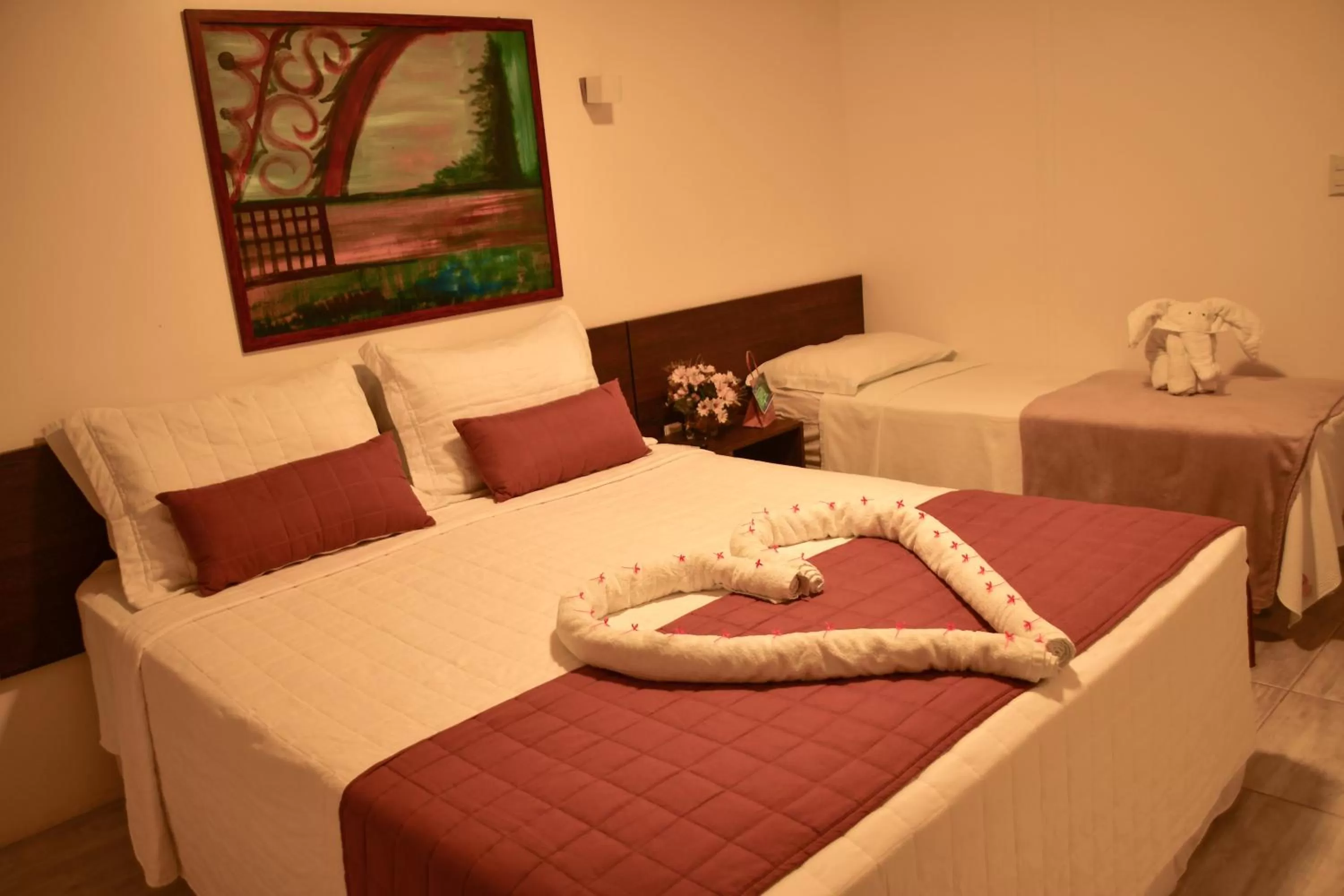 Bed in Pousada Sol e Mar