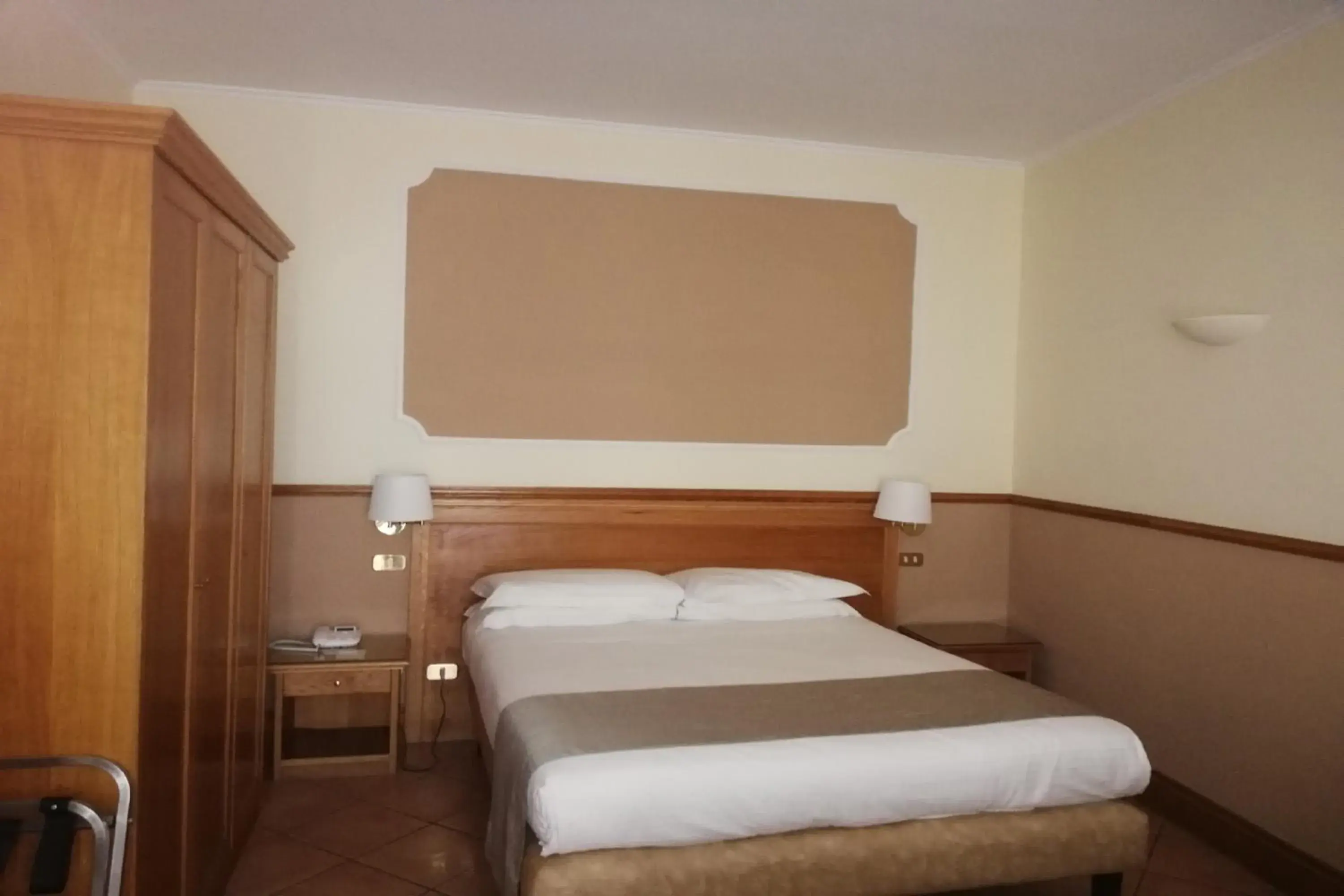 Bed in Hotel Leopardi