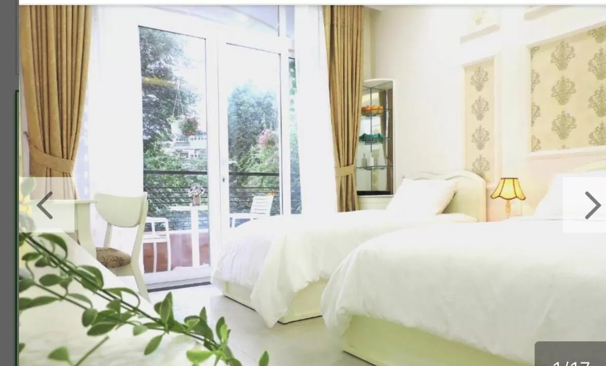 Bed in Chez Lotus Rose