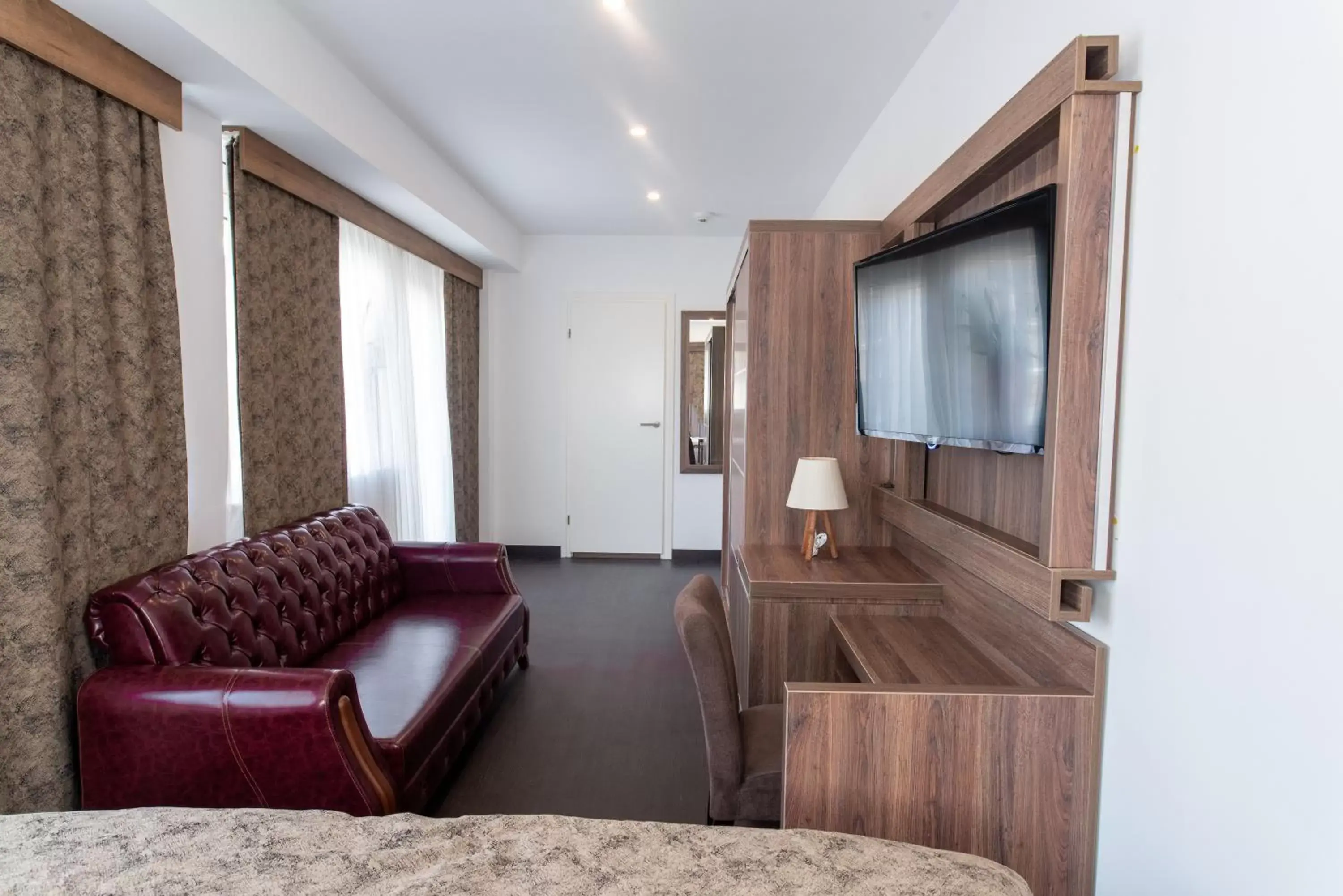 Communal lounge/ TV room, Seating Area in Hotel Cataleya