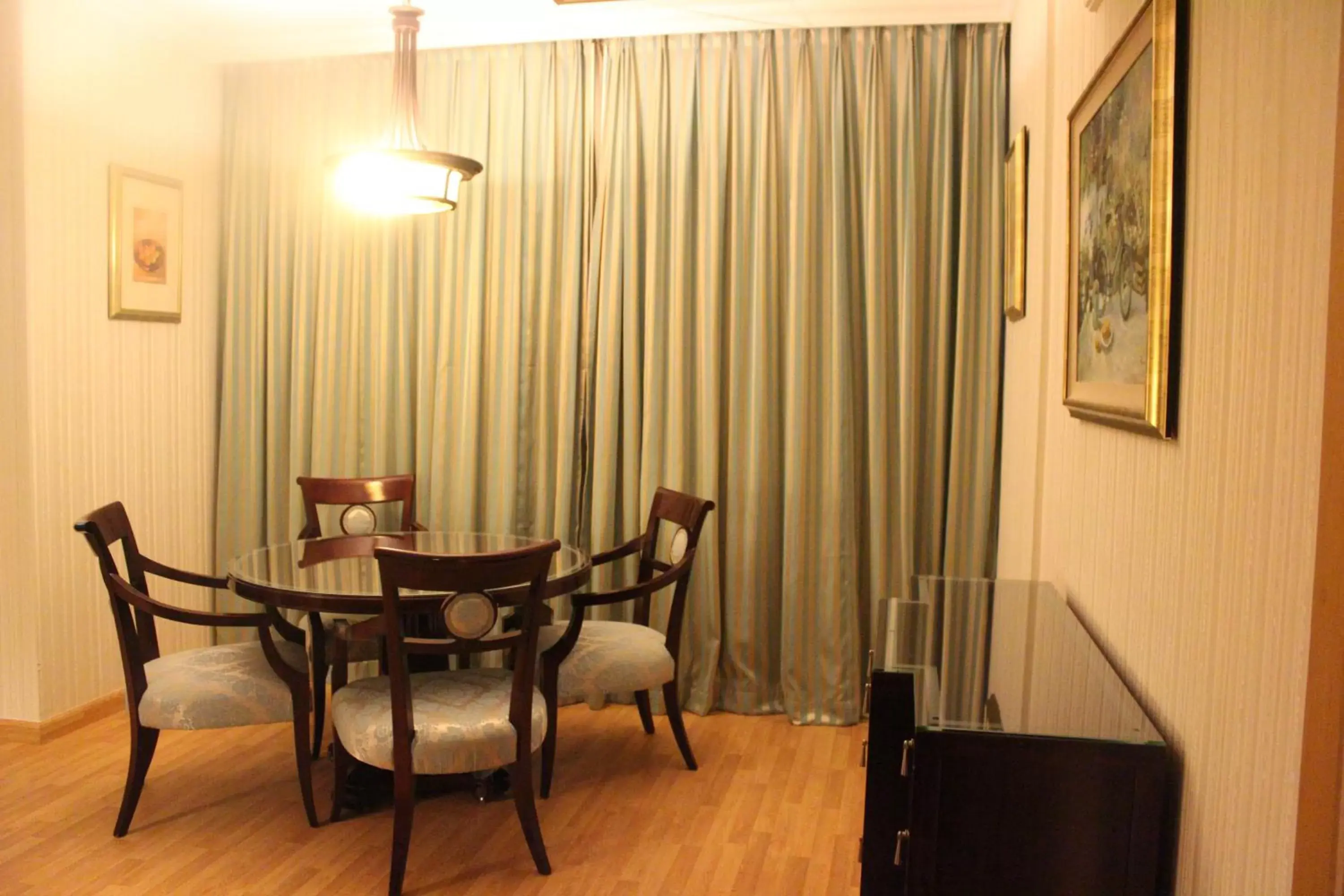 Living room, Dining Area in Swiss Al Hamra Hotel