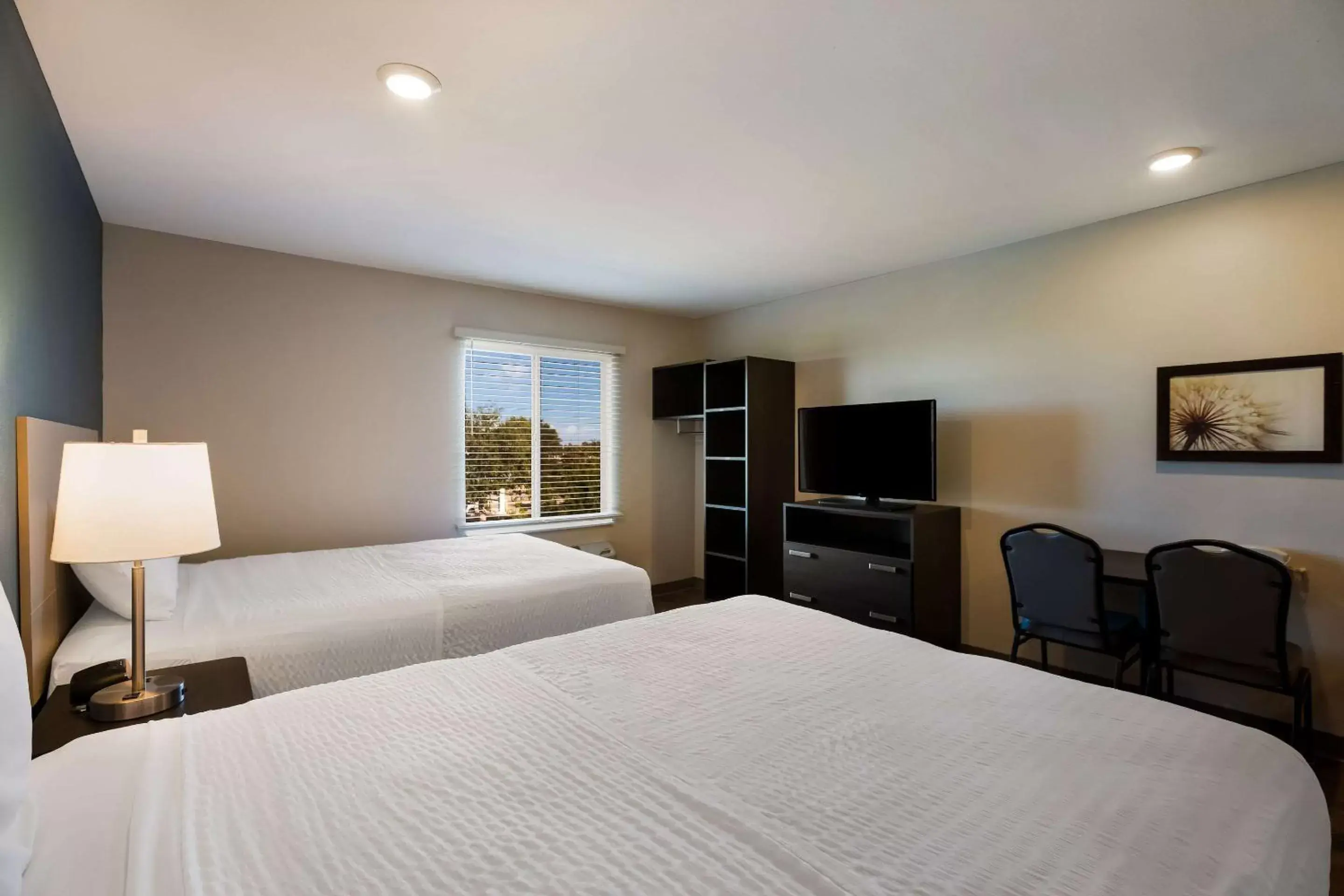 Bedroom, Bed in WoodSpring Suites Orlando West - Clermont