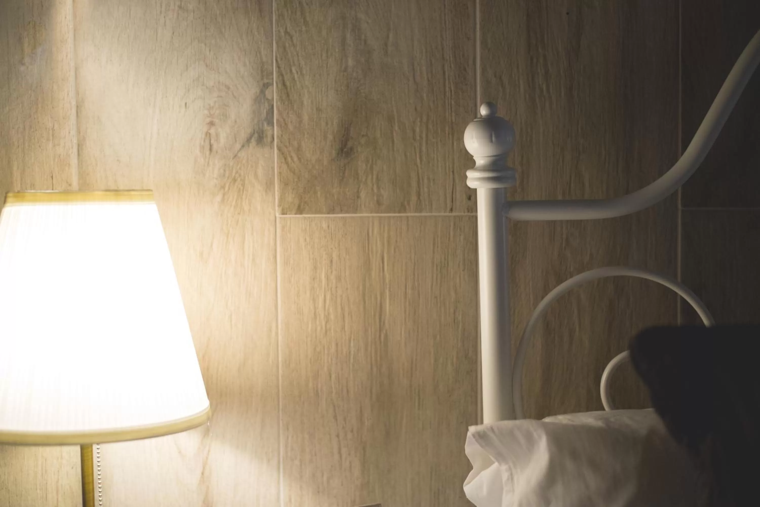 Decorative detail, Bed in Elegant B&B - Il Vicolo storico