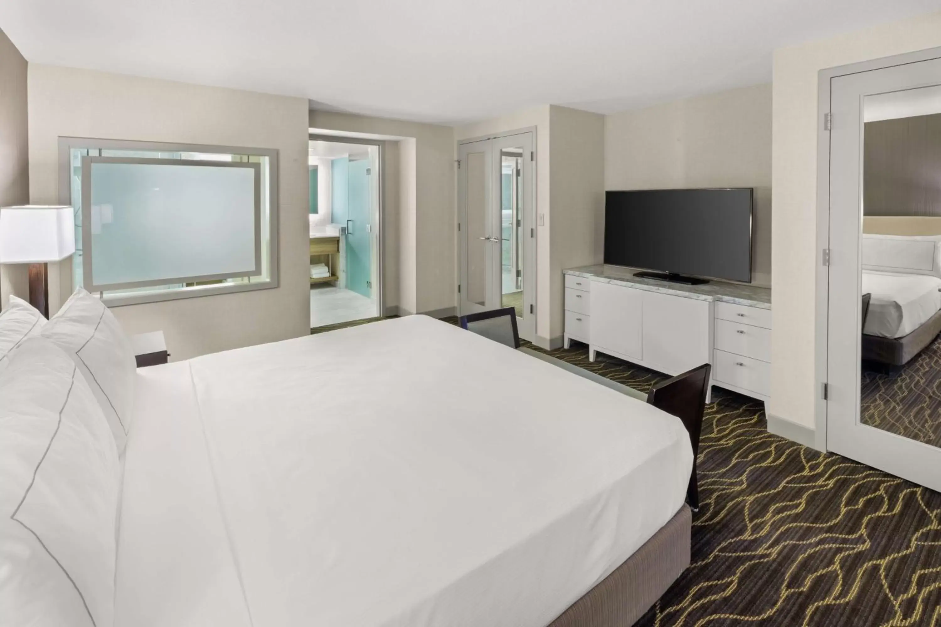 Bedroom, TV/Entertainment Center in Hilton Salt Lake City Center