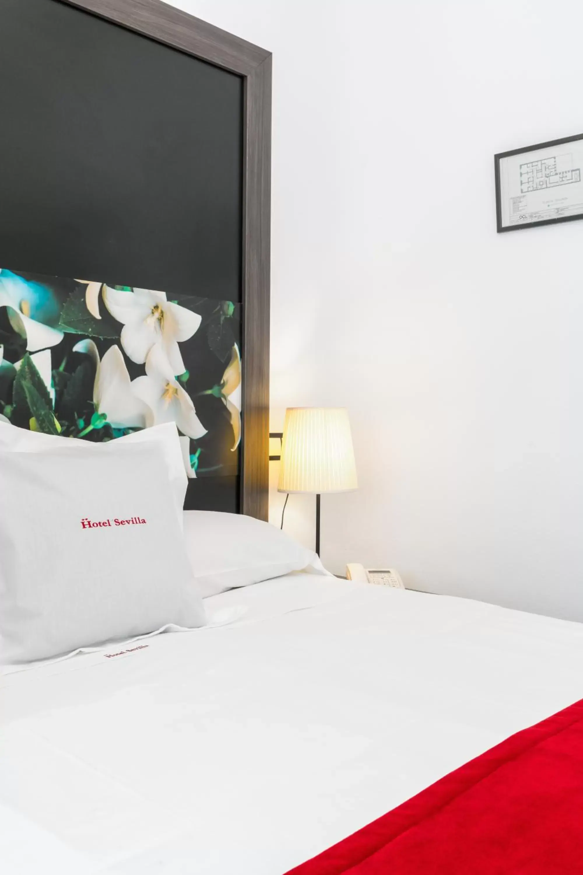 Bed in Hotel Sevilla