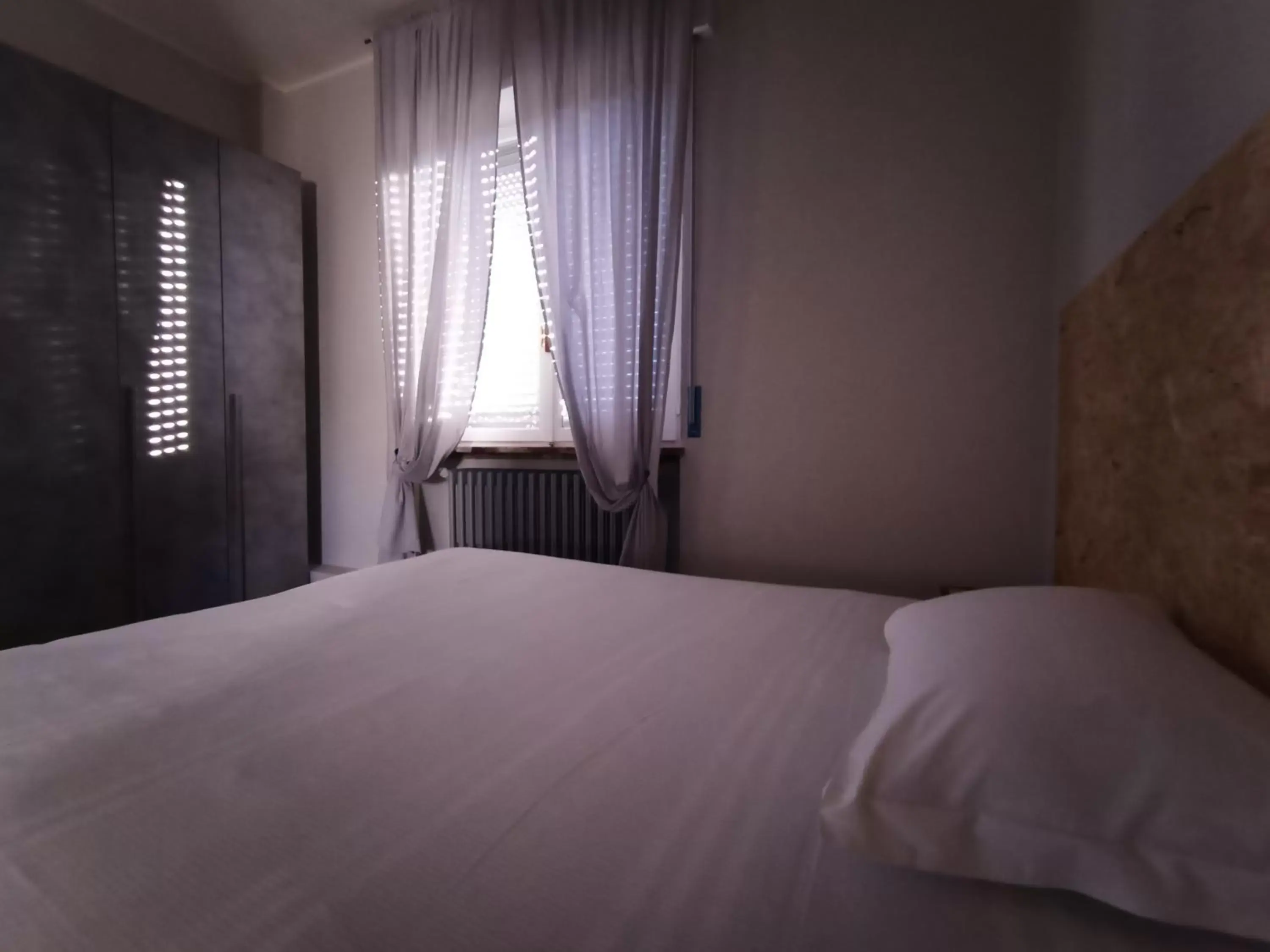 Photo of the whole room, Bed in LE MURA Foresteria