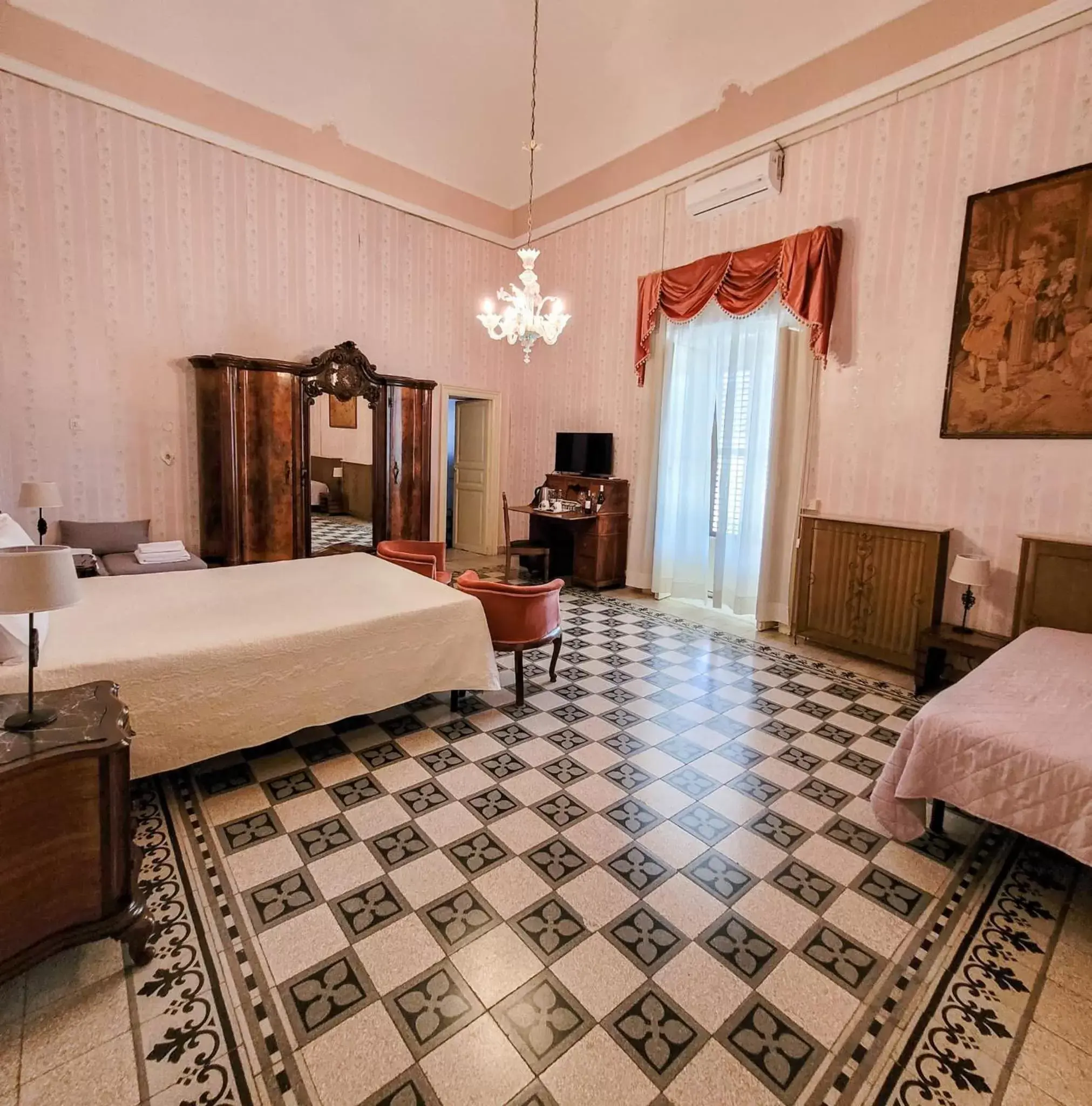 Photo of the whole room in Residenza Donnafugata B&B