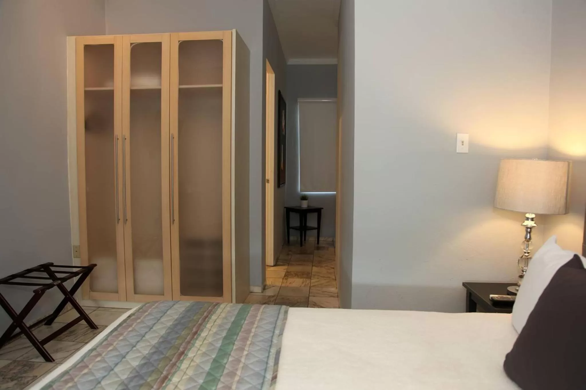 Photo of the whole room, Bed in Coral Princess Hotel