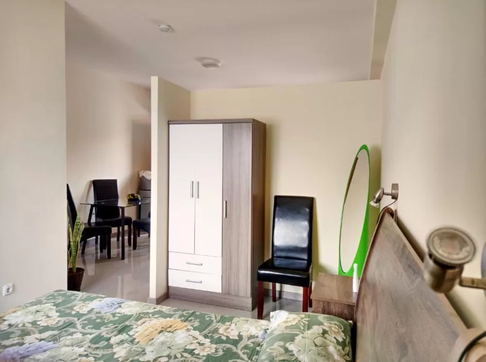 TV/Entertainment Center in Praia Capital Residence