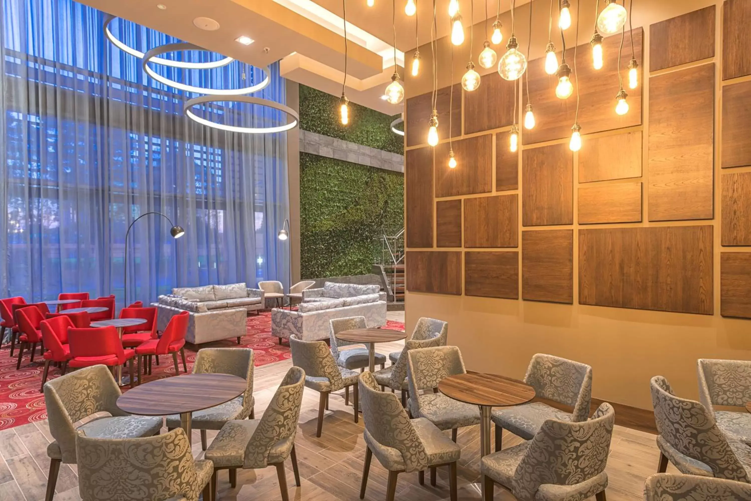 Lounge or bar in Hilton Garden Inn Bogota Airport
