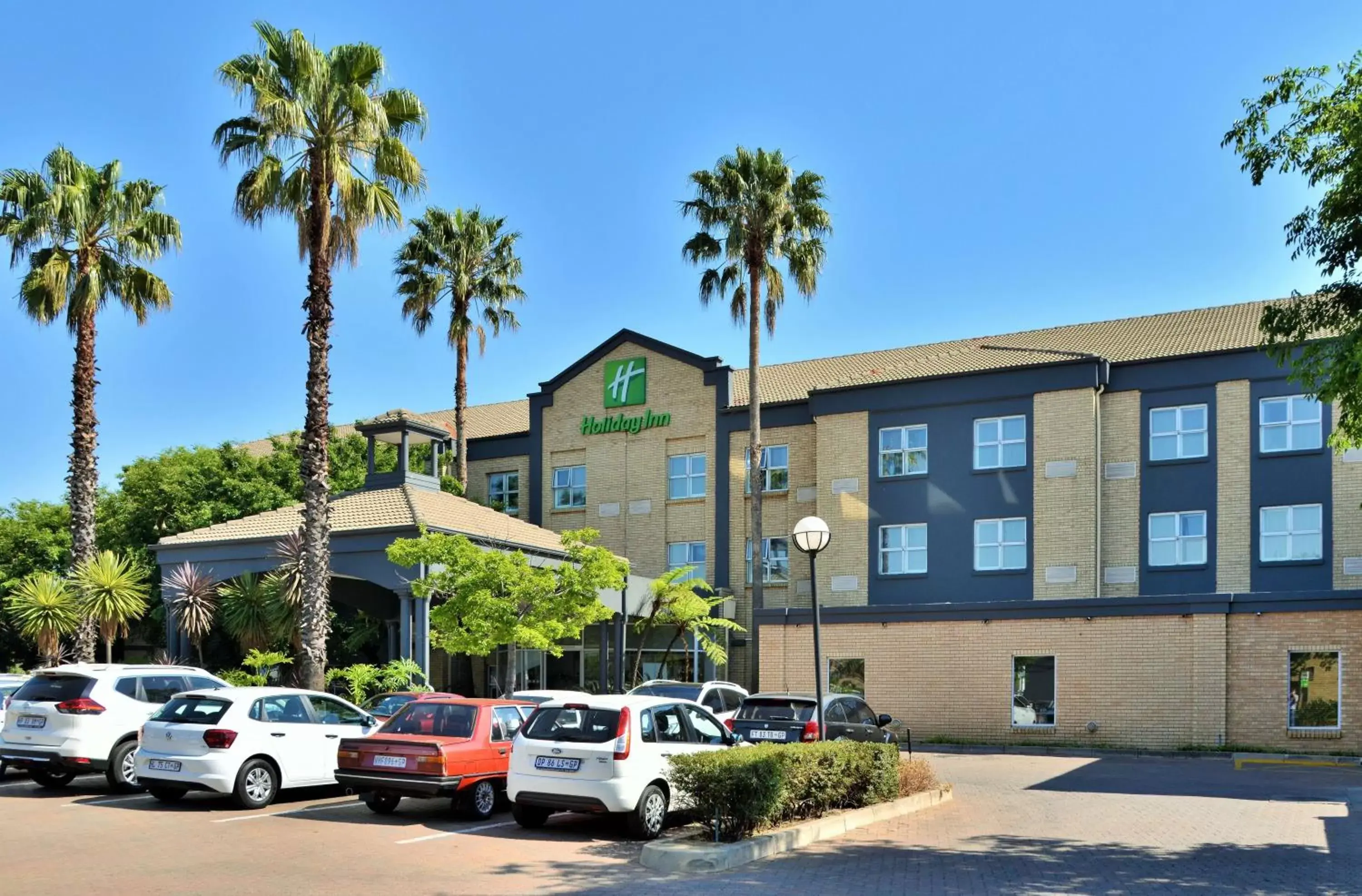 Property building in Holiday Inn Johannesburg OR Tambo Airport Hotel by IHG Property building in Holiday Inn Johannesburg OR Tambo Airport Hotel by IHG