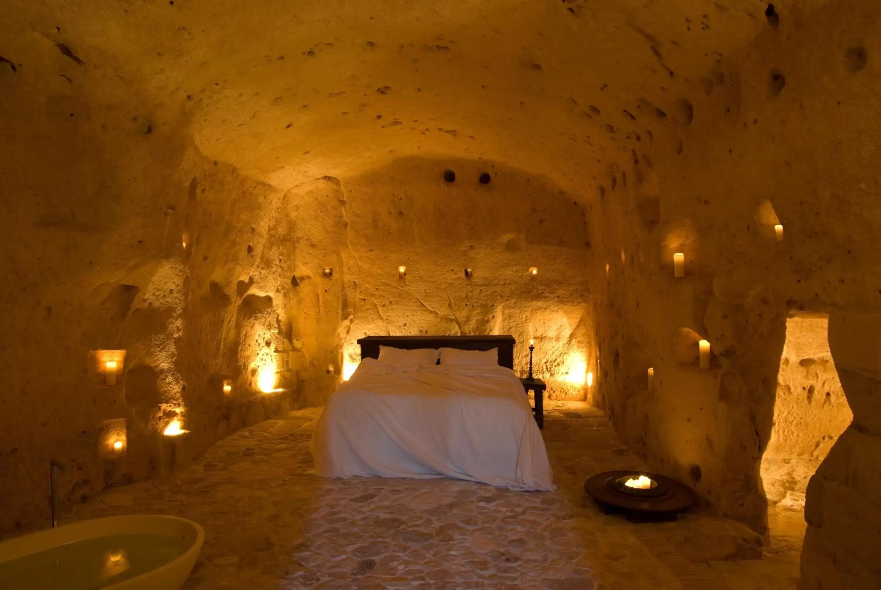Photo of the whole room, Bed in Sextantio Le Grotte Della Civita