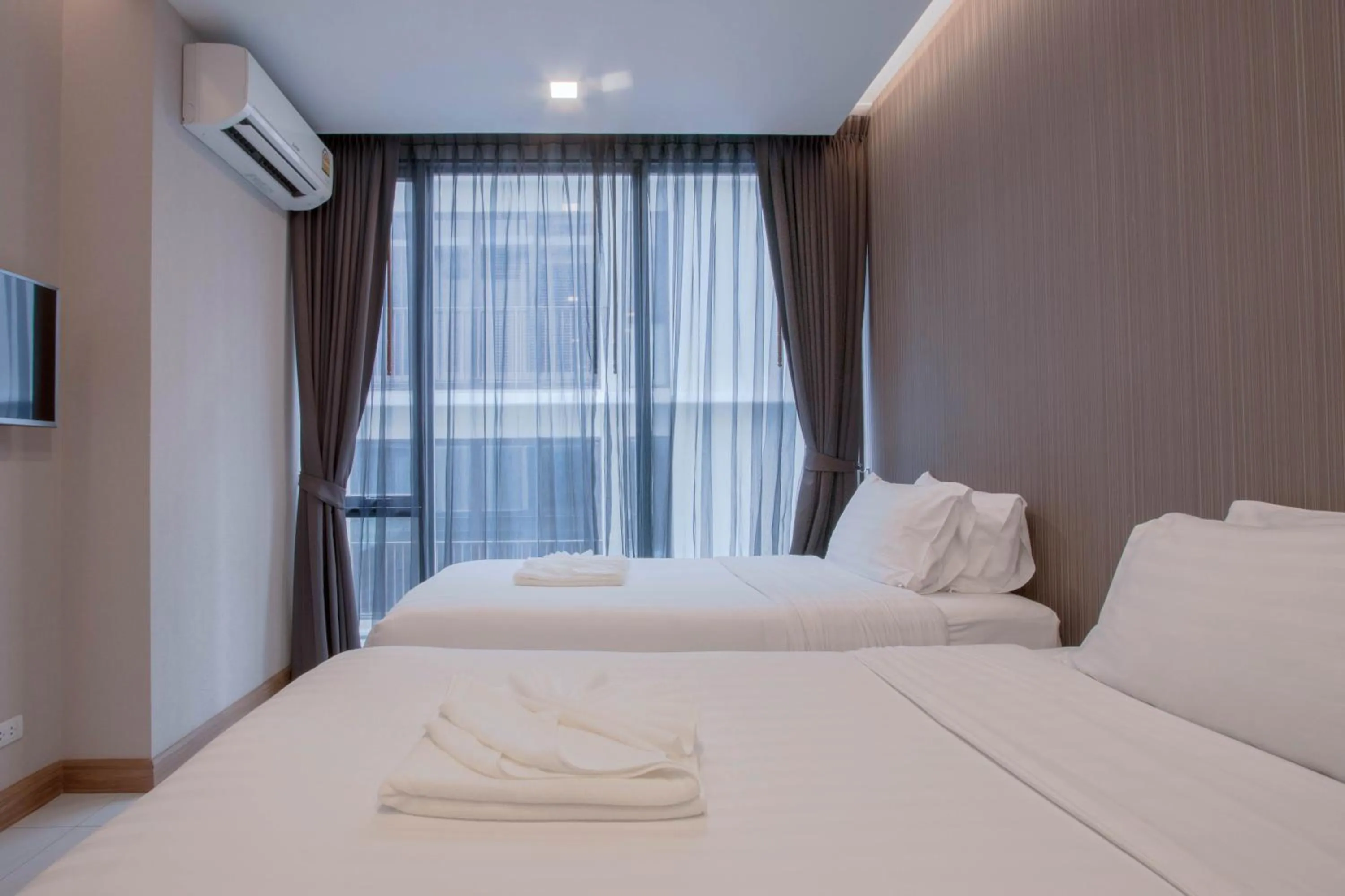 Bed in Kepler Residence Bangkok