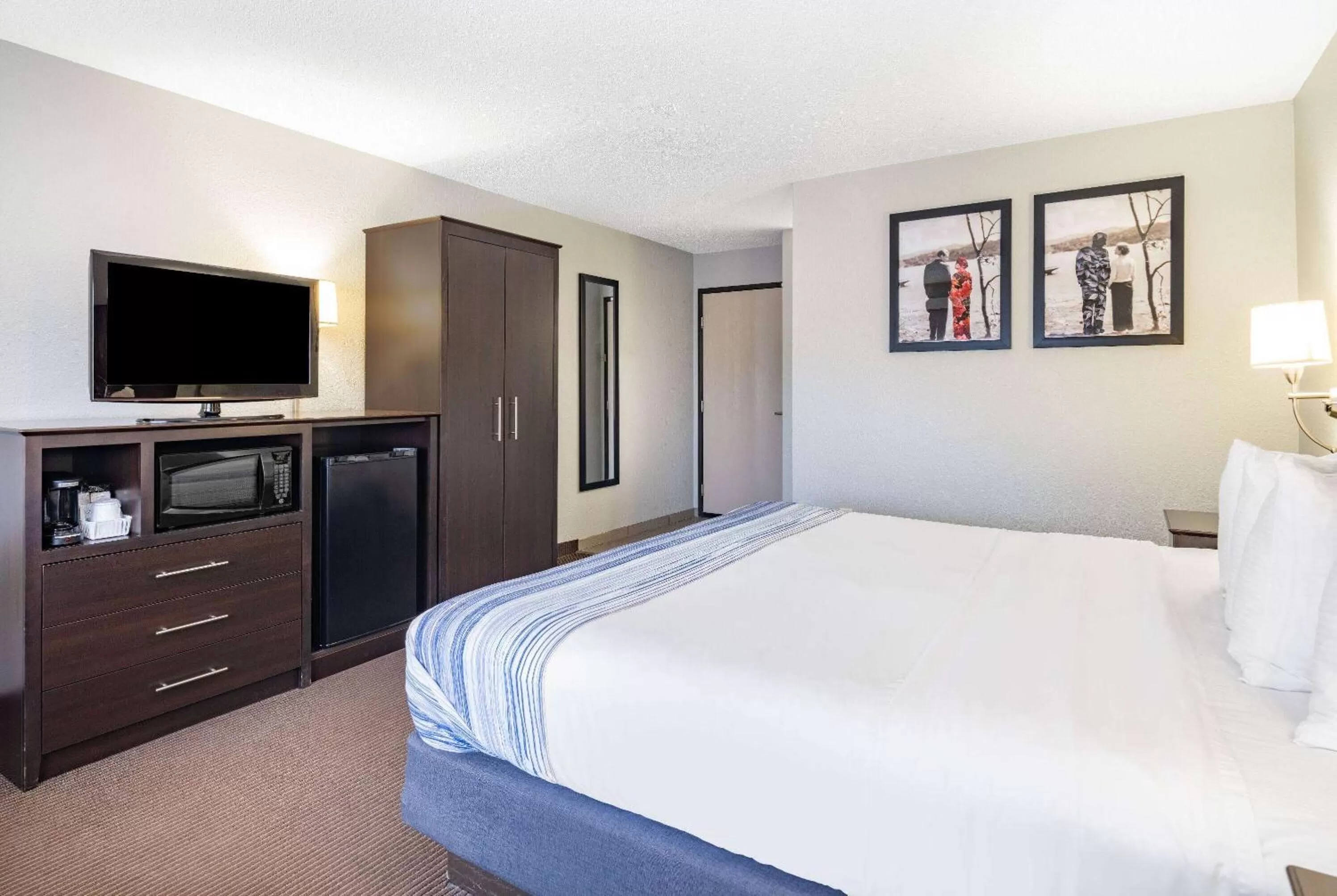 Photo of the whole room, Bed in AmericInn by Wyndham Plover Stevens Point