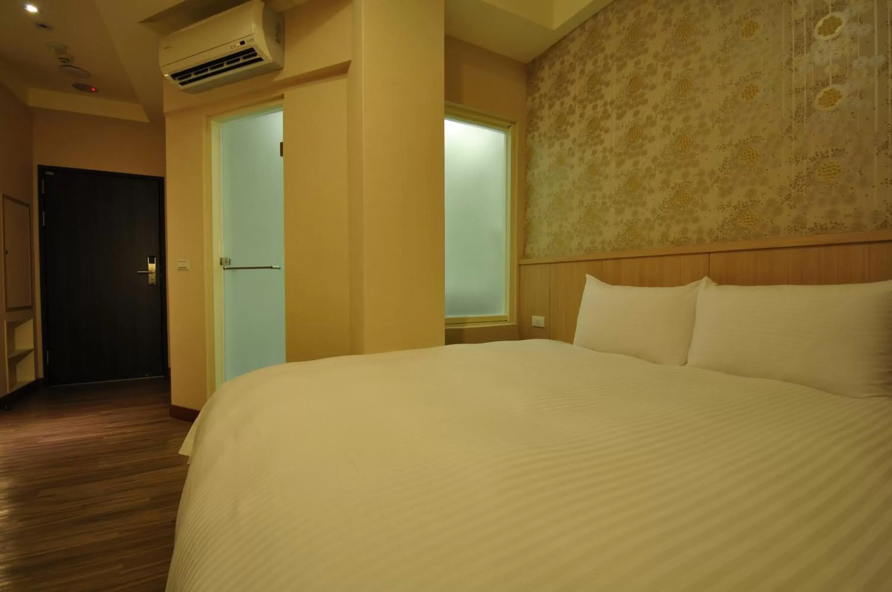 Bed in Fupin Hotel