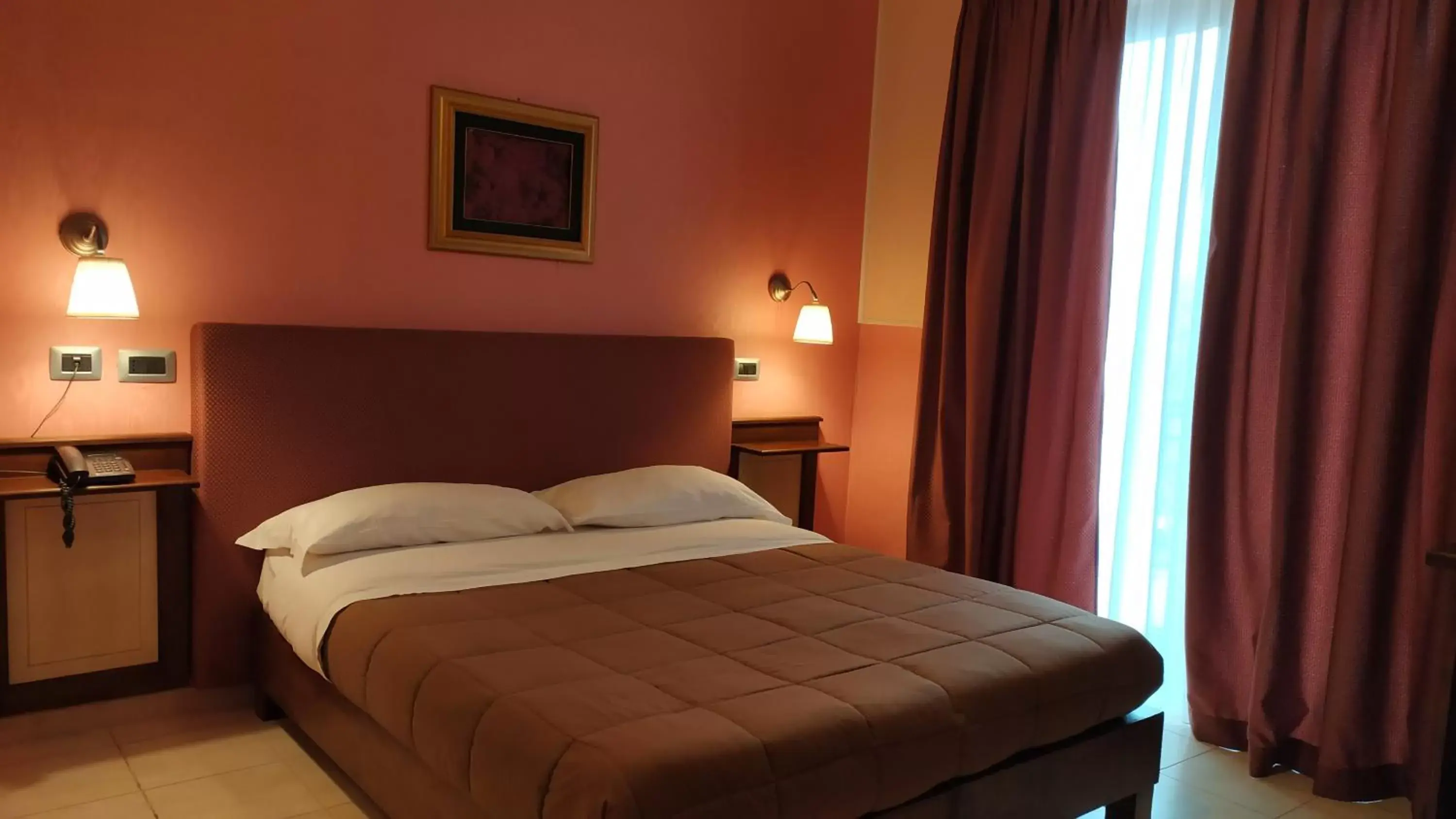 Bed in La Contessa Hotel e b&b