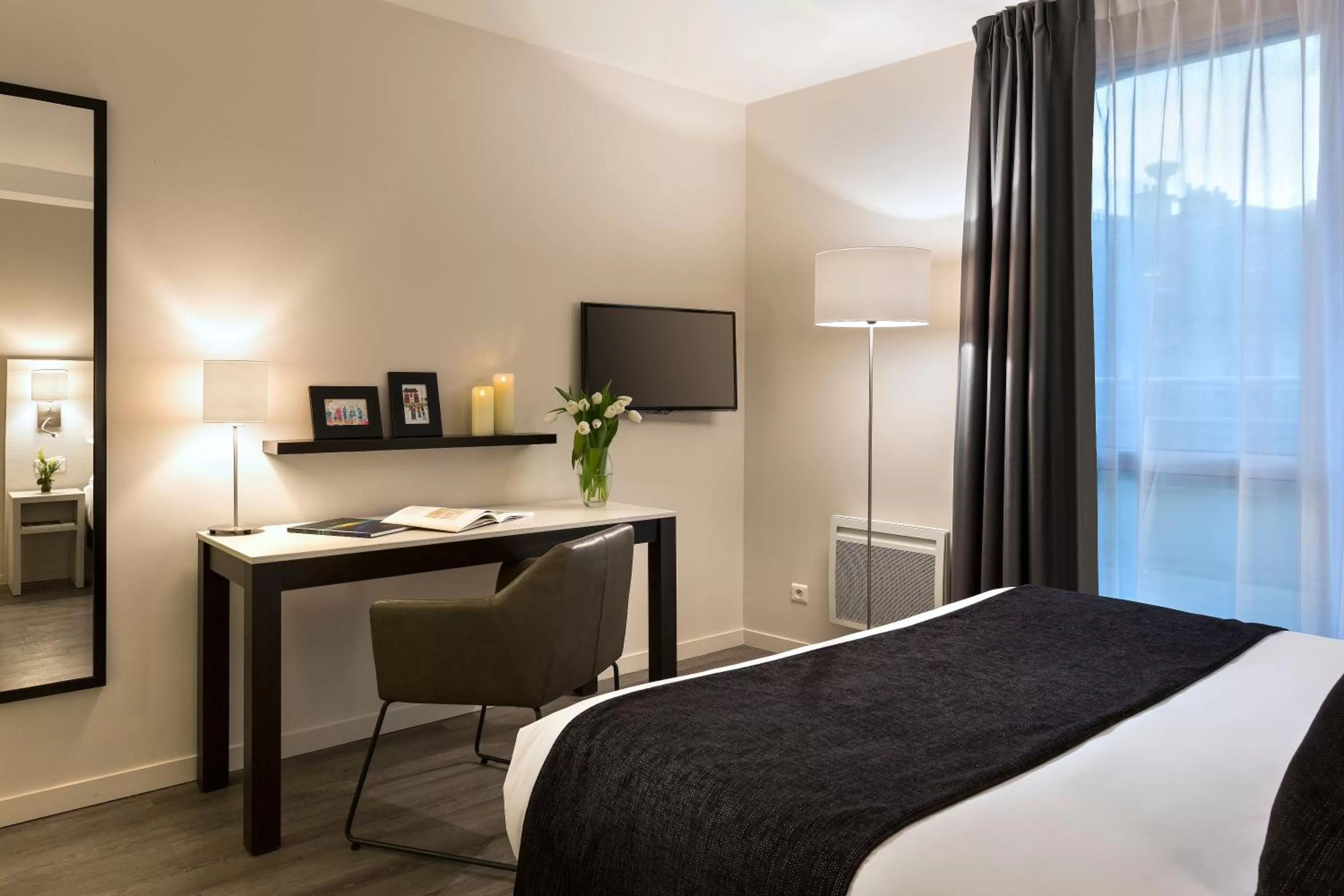 Bed in Citadines Montmartre Paris