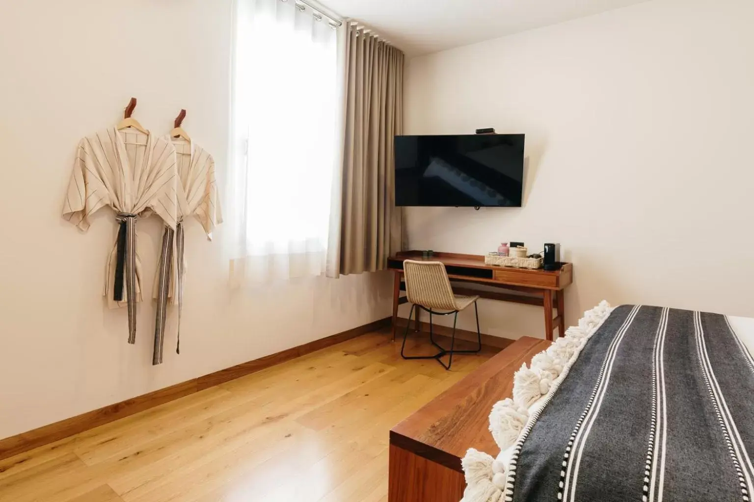 TV and multimedia, TV/Entertainment Center in Majagua Hotel Boutique -Adults Only