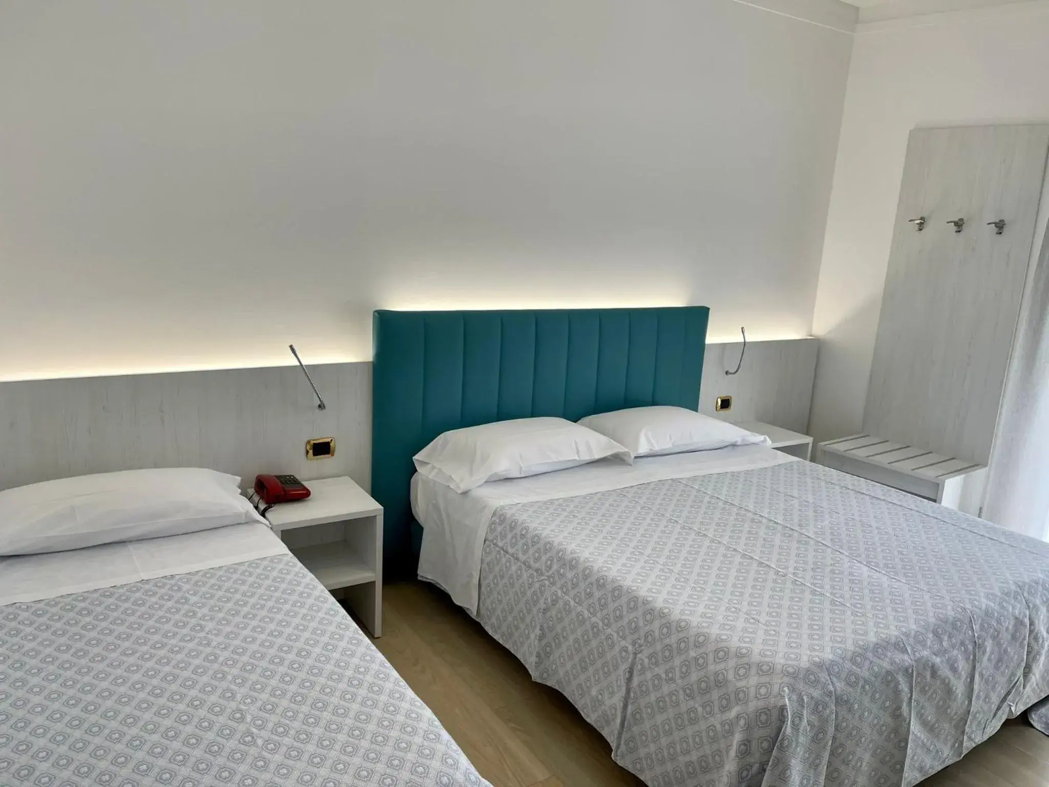 Bed in Hotel Corallo