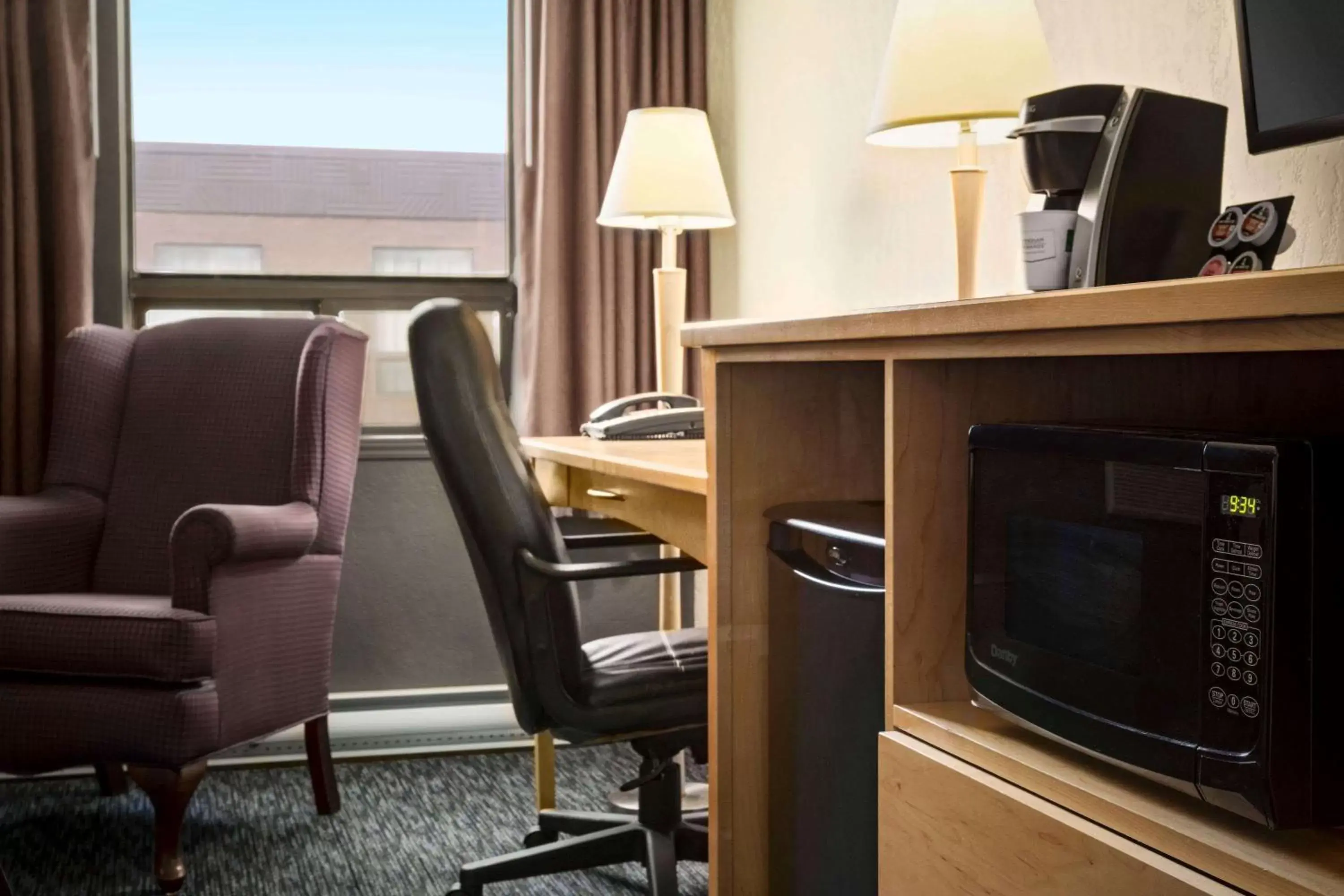 Photo of the whole room, TV/Entertainment Center in Travelodge by Wyndham Edmonton West