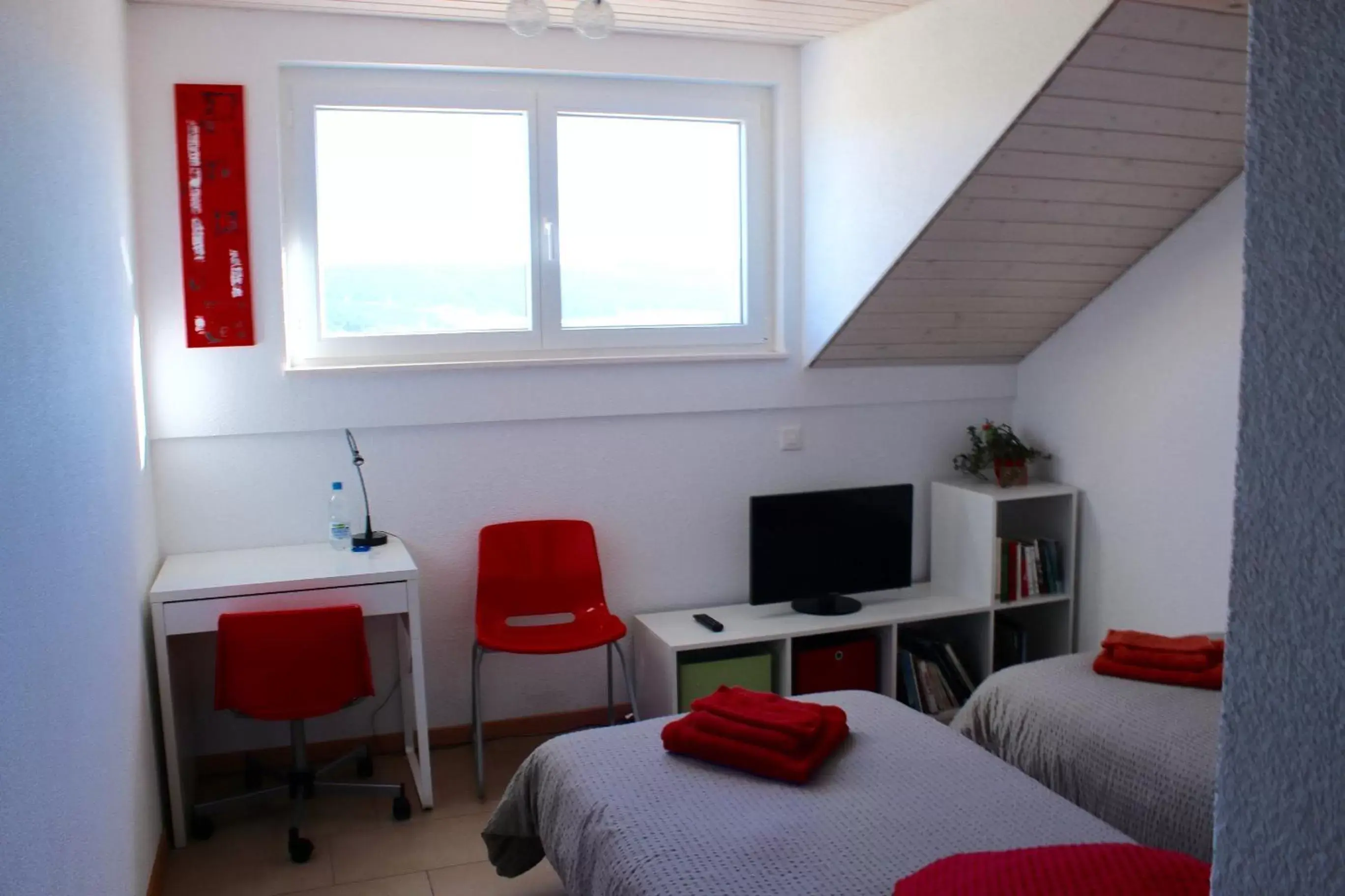 Bedroom, TV/Entertainment Center in BNB Les Prises